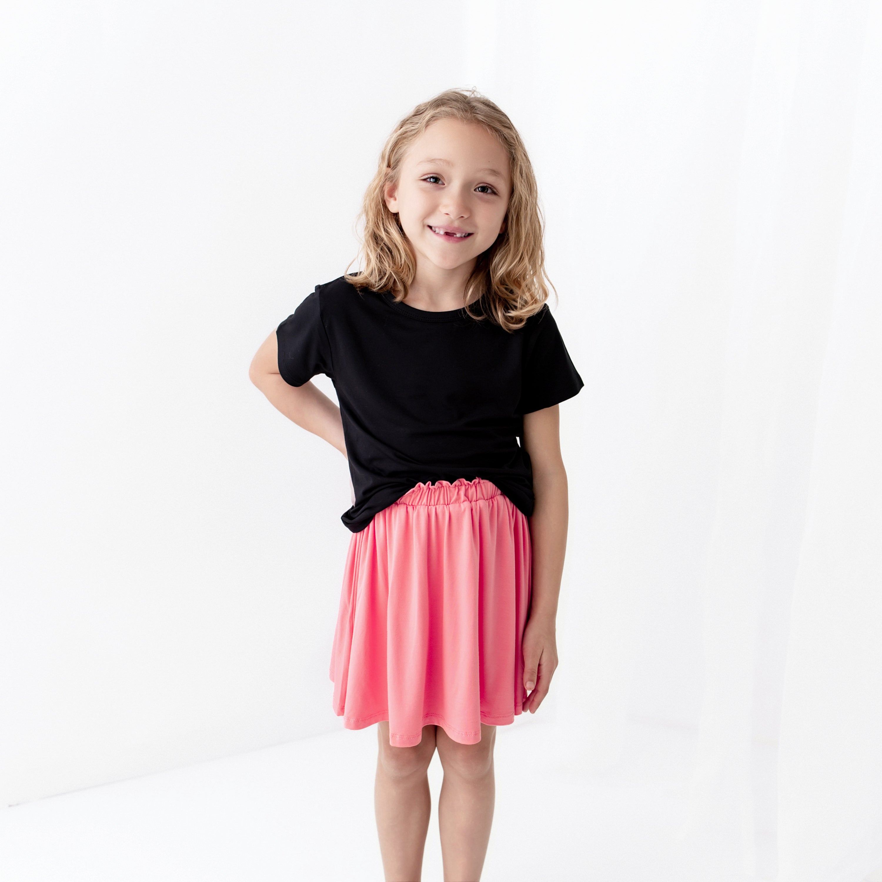 Toddler modeling Toddler Skort in Guava