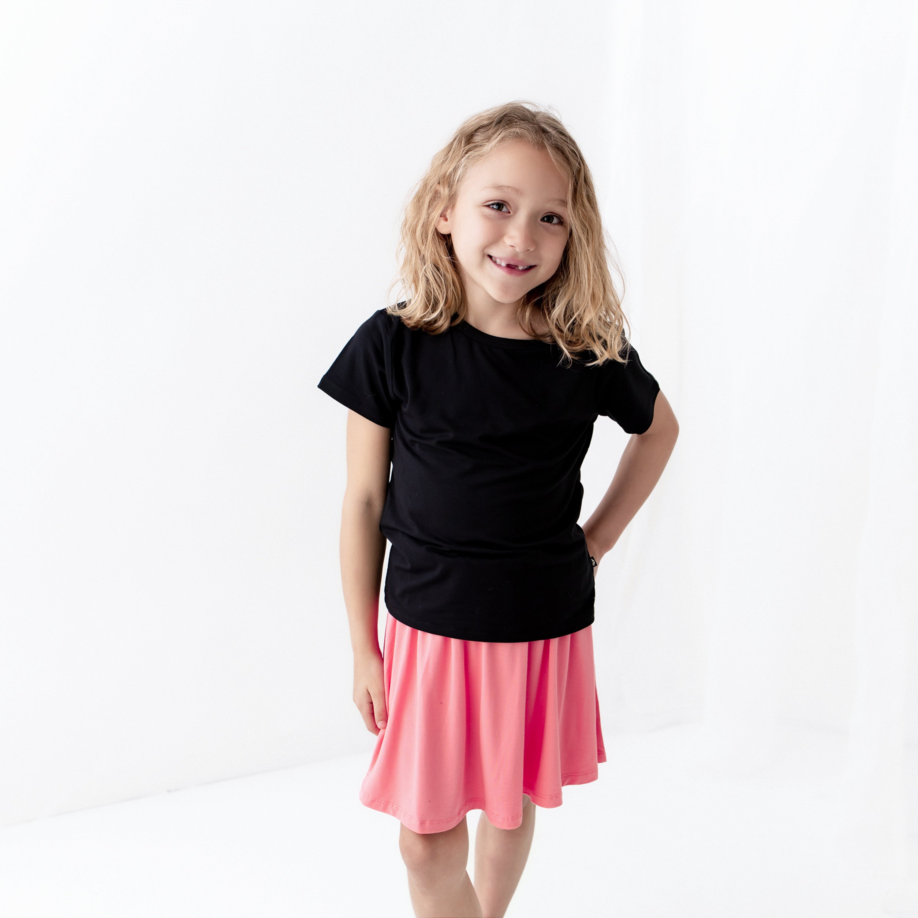 Toddler modeling Toddler Skort in Guava