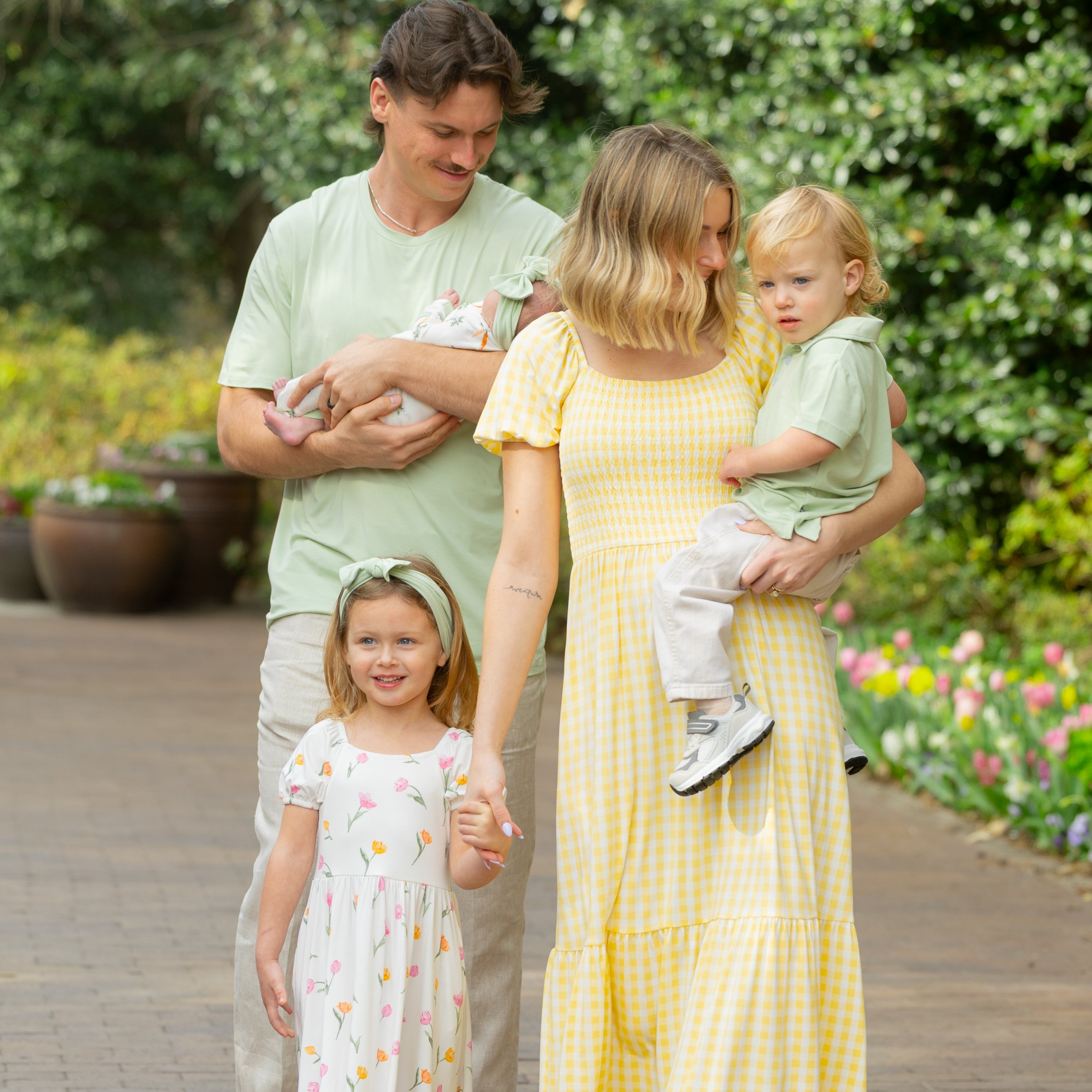 Family of five wearing pieces from the spring and easter collection