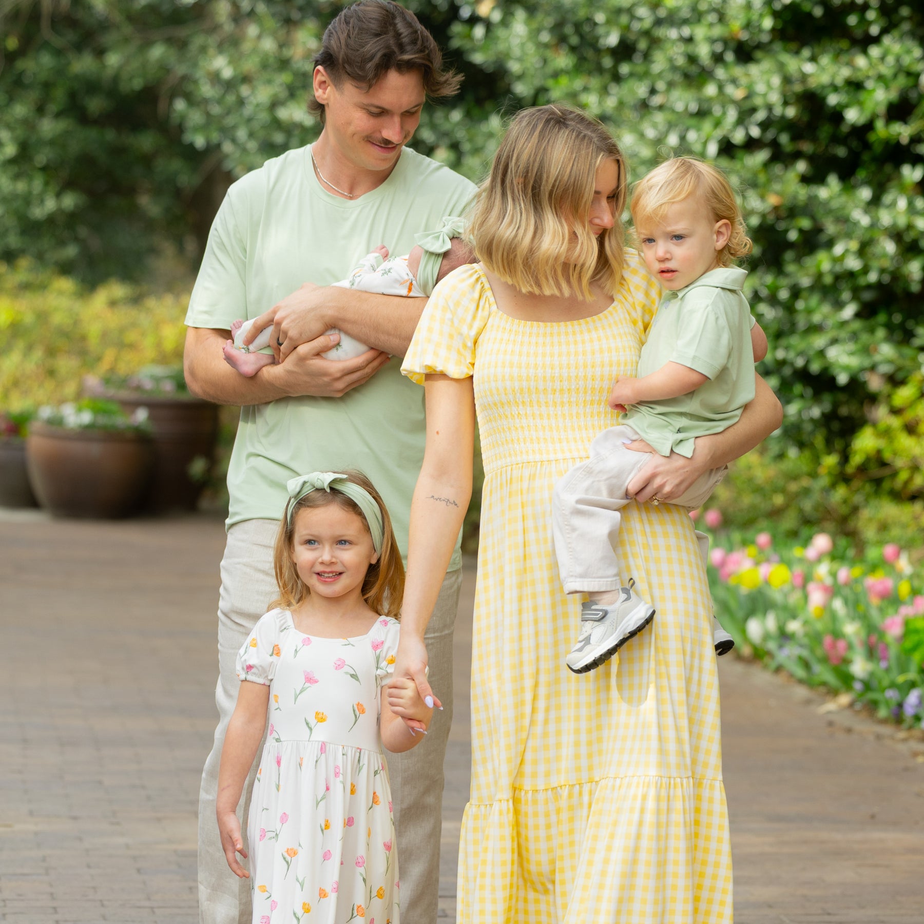 Family of five wearing pieces from the spring and easter collection