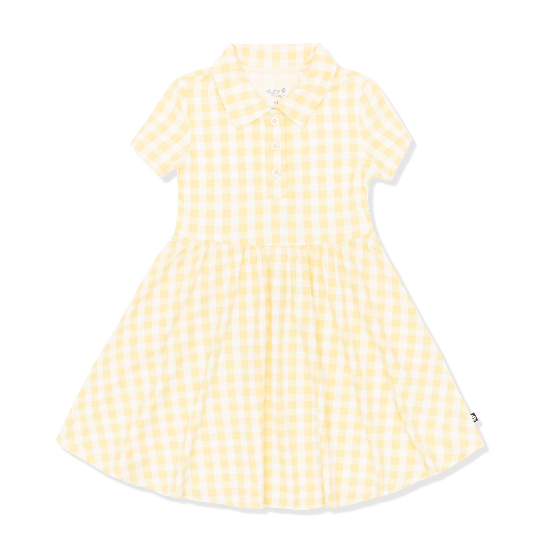 Product photo of the Polo Dress in Gingham Chamomile on a white surface