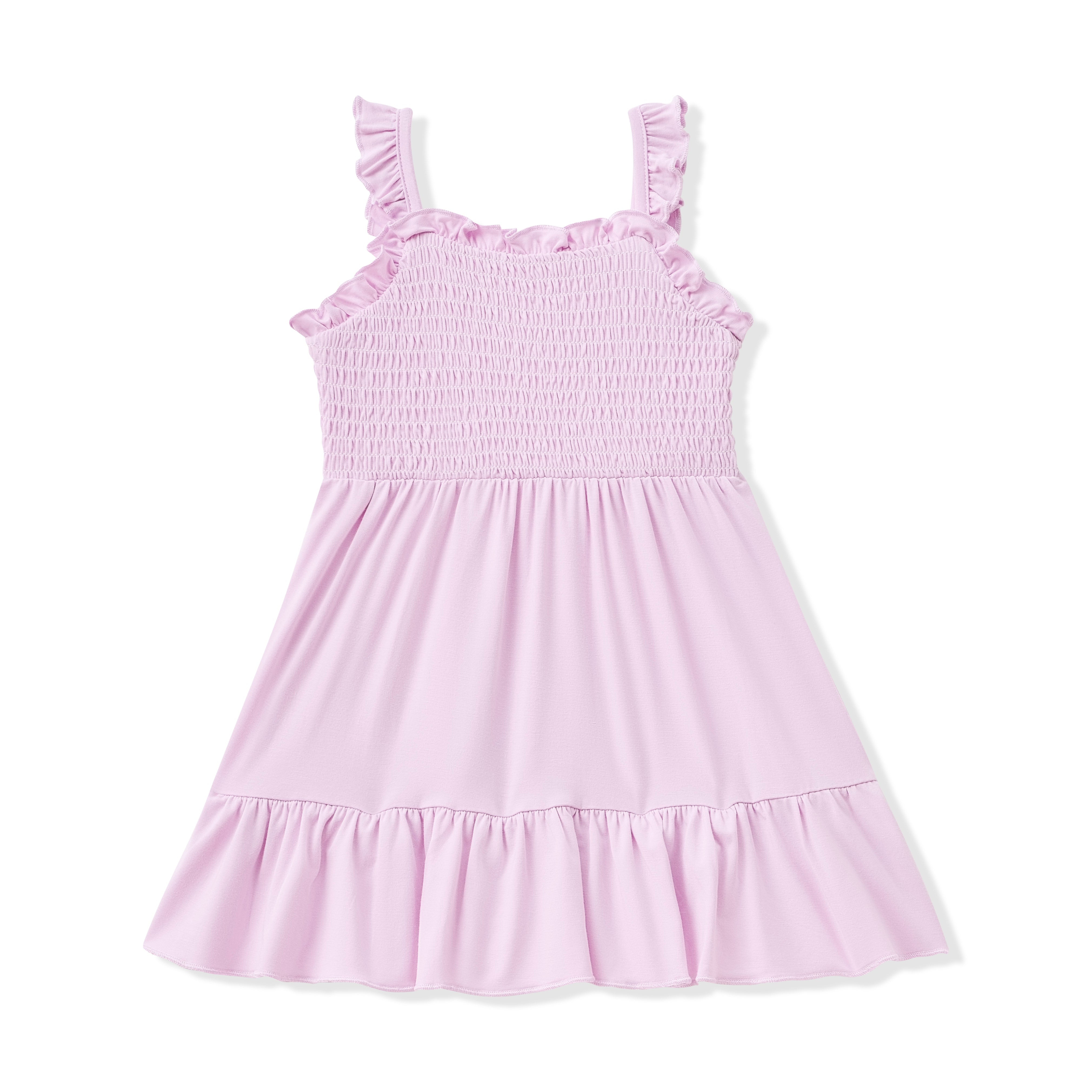 Pink smocked dress with ruffled straps on a white background
