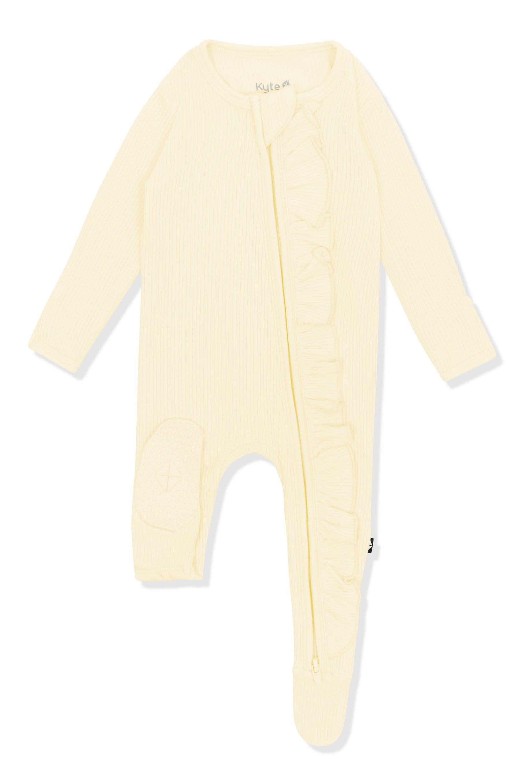 The bottom foot pad on the Ribbed Ruffle Zipper Footie in Chamomile