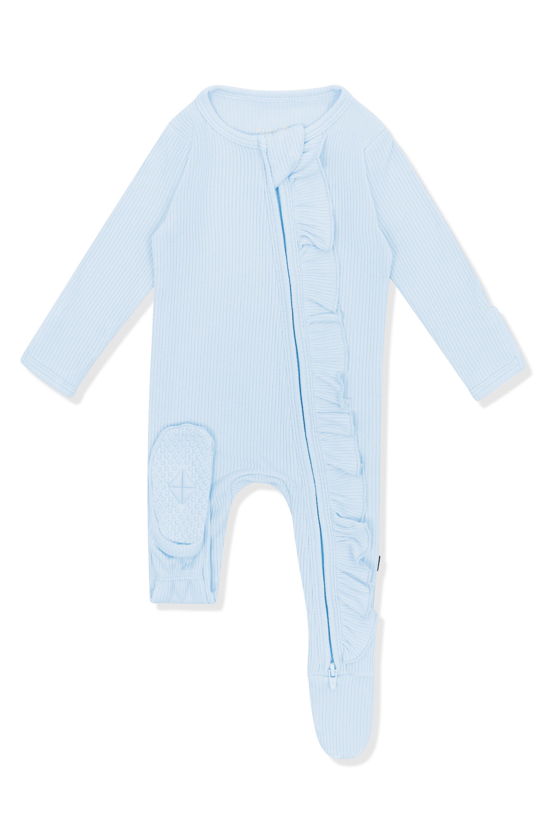 The bottom foot pad shown on the Ribbed Ruffle Zipper Footie in Breeze
