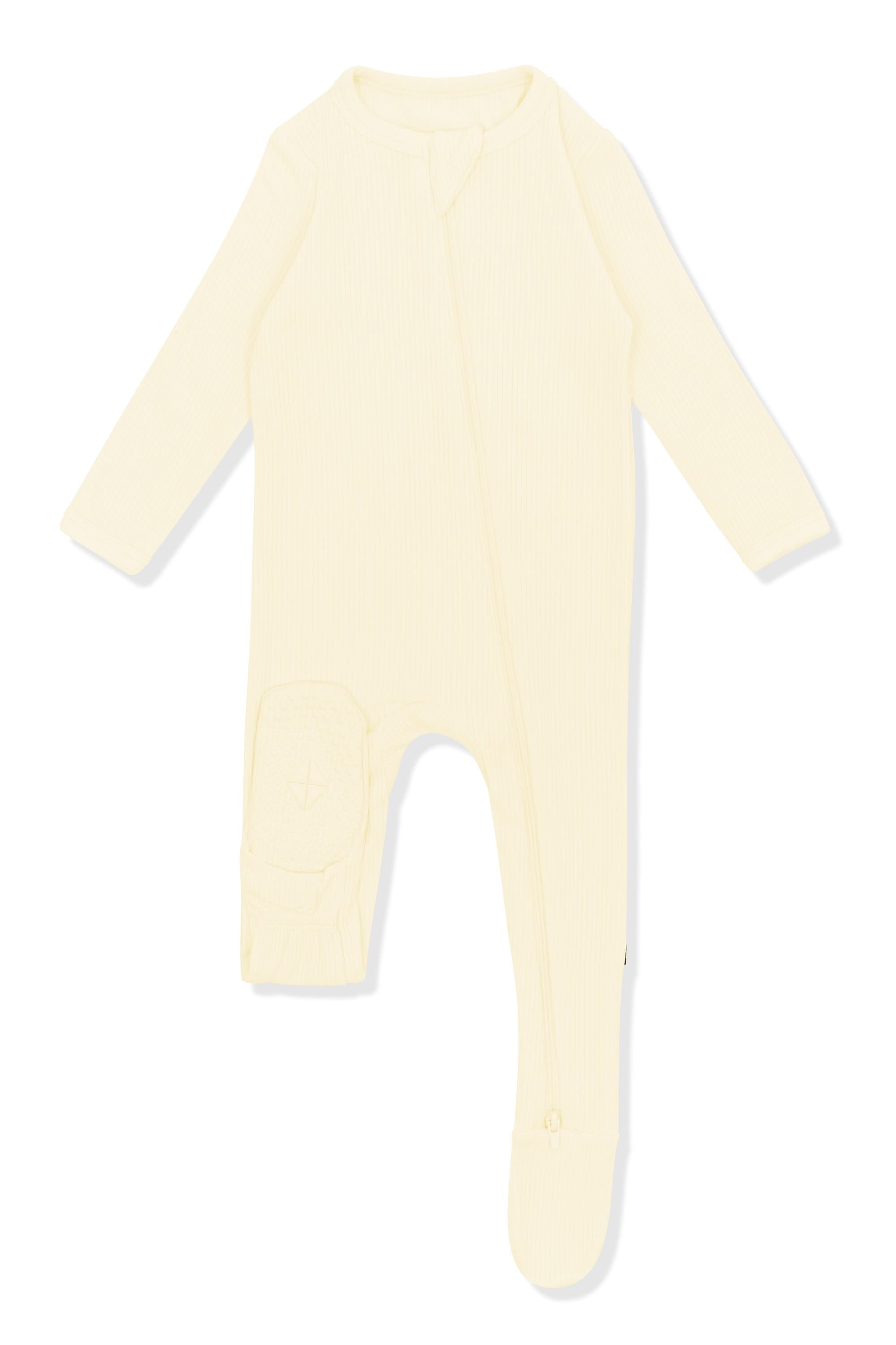 The bottom of the foot pad shown on the Ribbed Zipper Footie in Chamomile