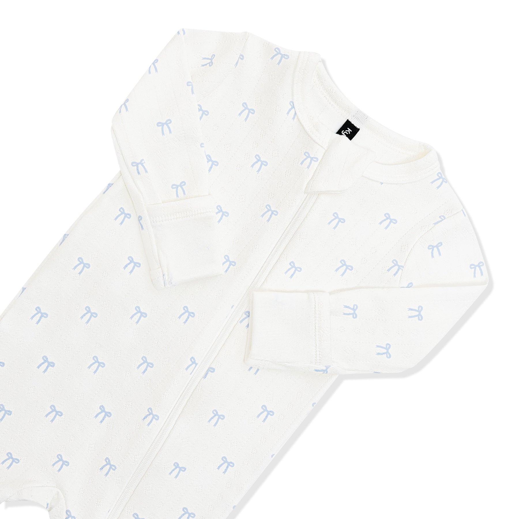 Close up of zipper garage and fold over hand cuffs on the Pointelle Zippered Footie in Sweet Blue Bow