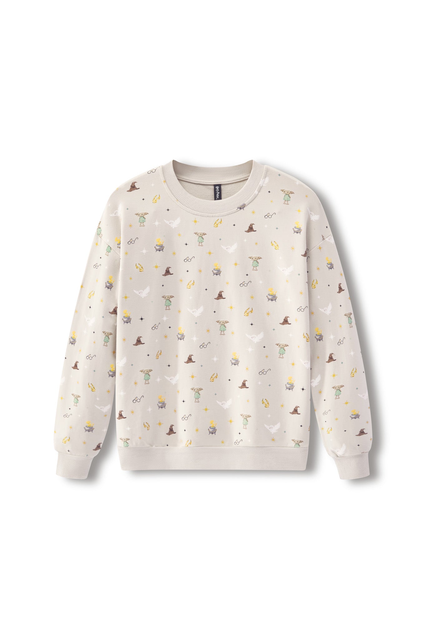 A cream-colored crewneck sweatshirt with an all-over print of small whimsical illustrations, including wizards, cauldrons, stars, and moons, displayed on a clean white background.