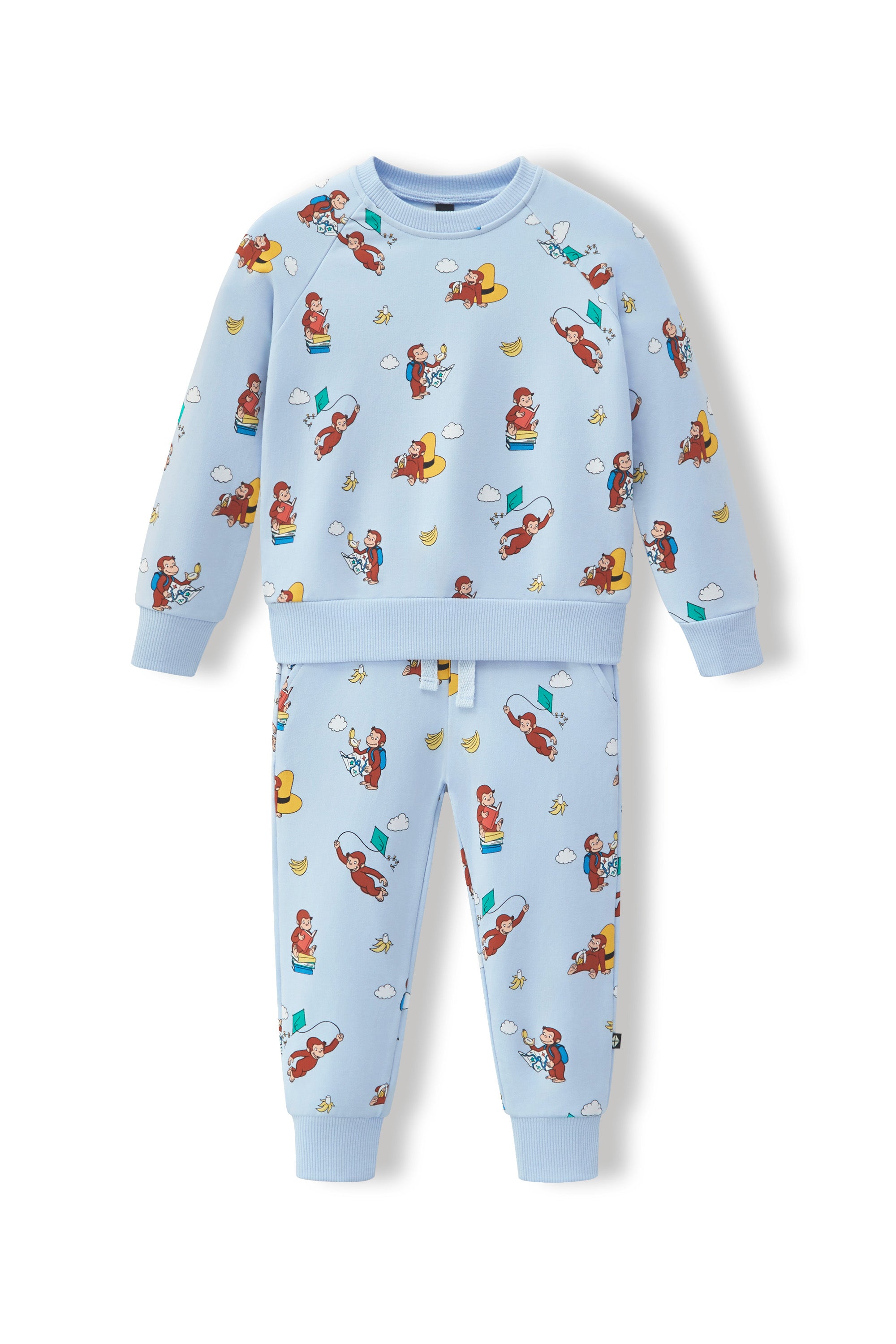 A two-piece kids' sweatshirt and jogger pants set in light blue, featuring an all-over cartoon monkey print, displayed on a clean white background.