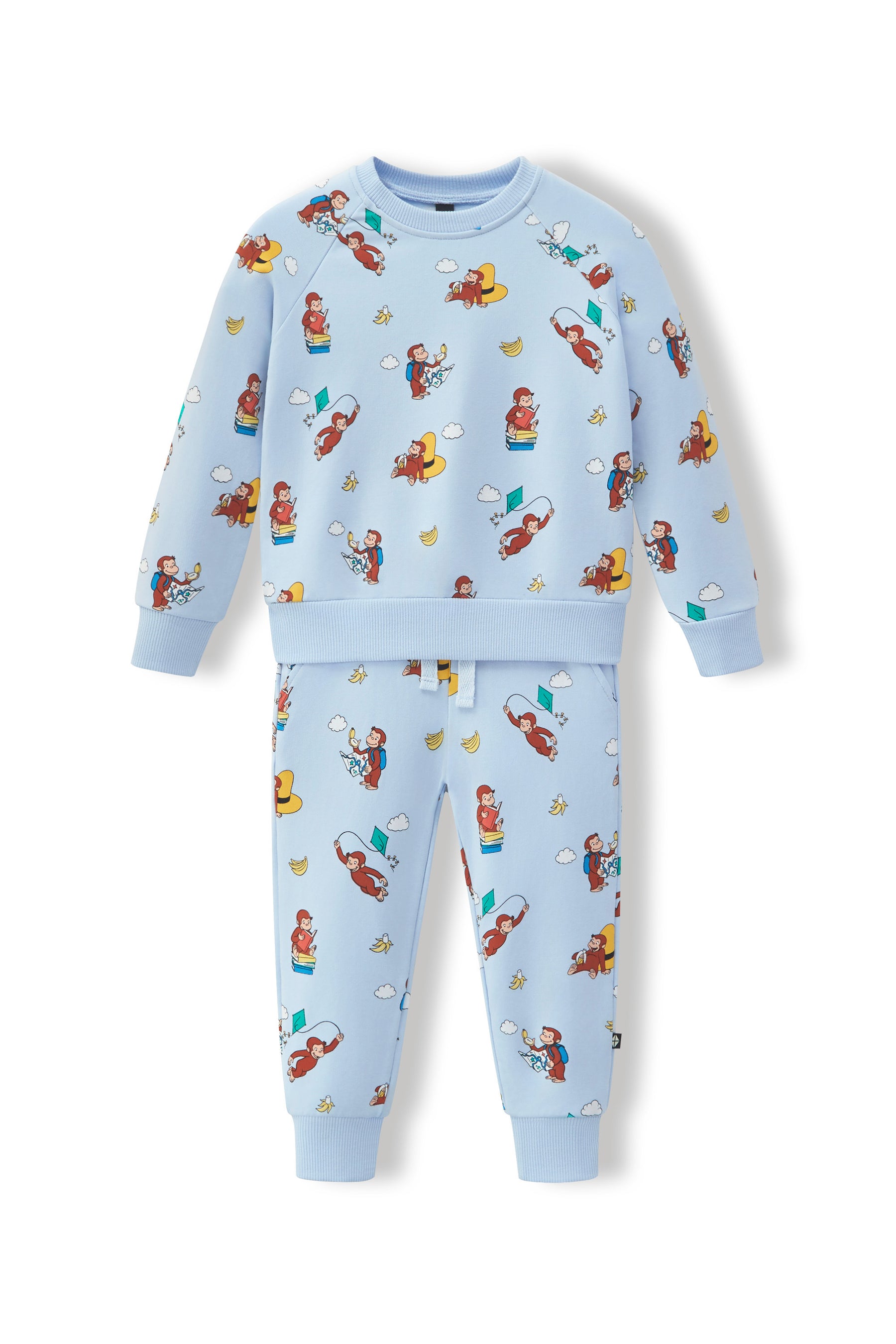 A two-piece kids' sweatshirt and jogger pants set in light blue, featuring an all-over cartoon monkey print, displayed on a clean white background.