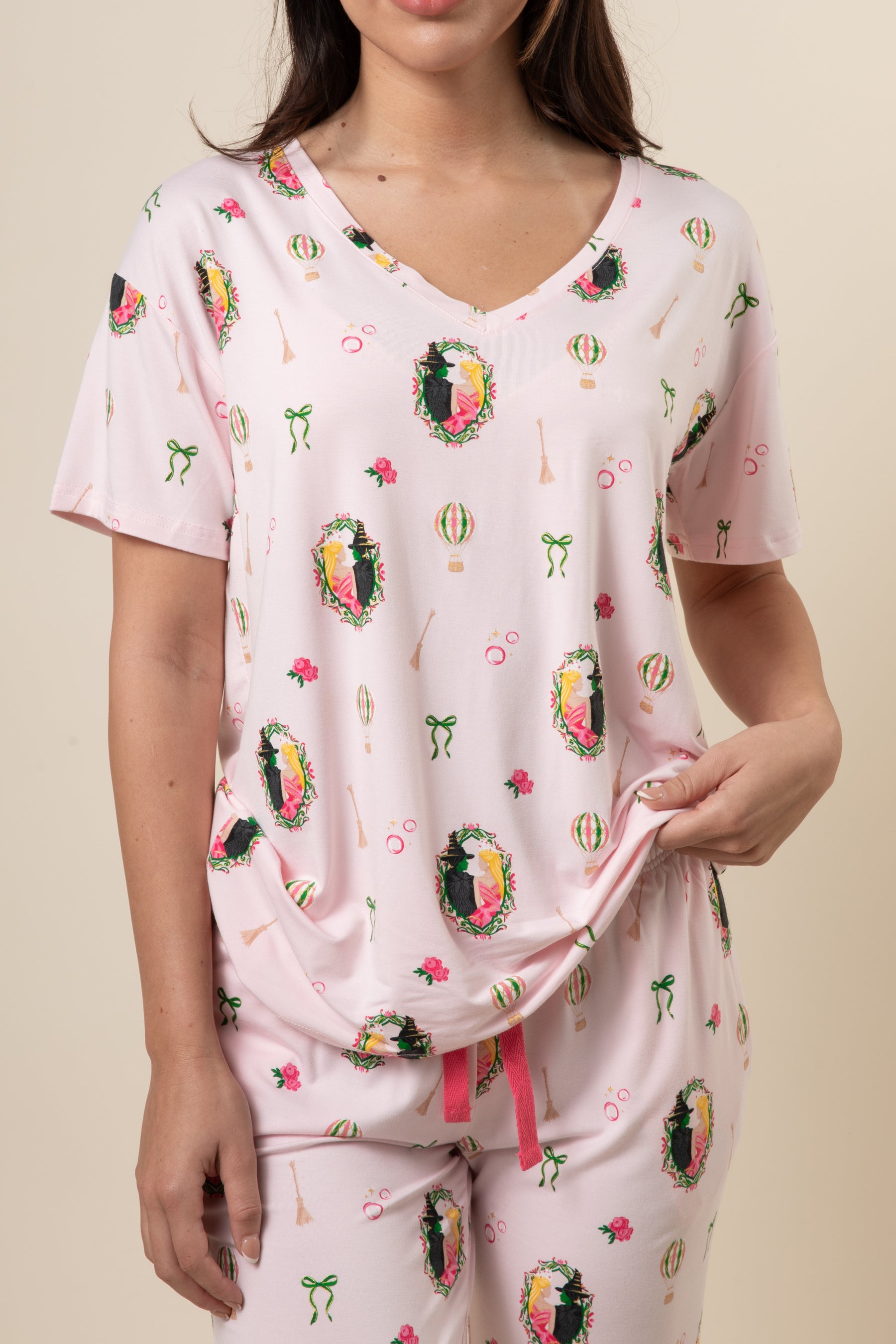 Close up of the Women's Relaxed Fit V-Neck in Wicked shown on a model