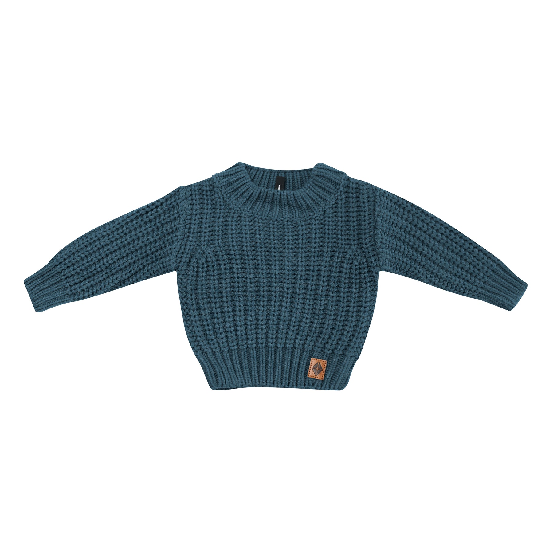 Product photo of the Chunky Knit Sweater in Atlantic with Kyte Baby vegan leather tag visible