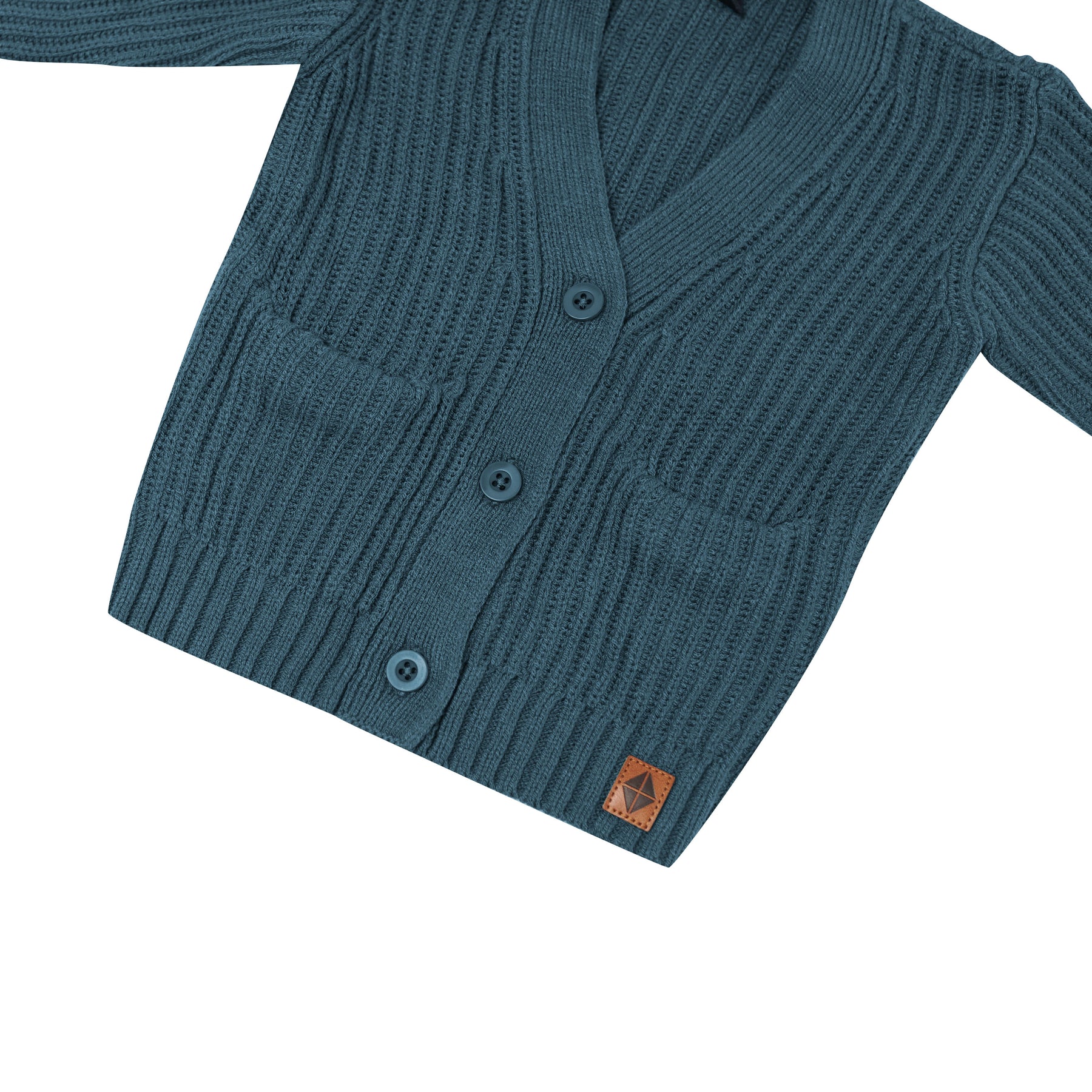 Close up of the pockets and button closures on the Chunky Knit Oversized Cardigan in Atlantic