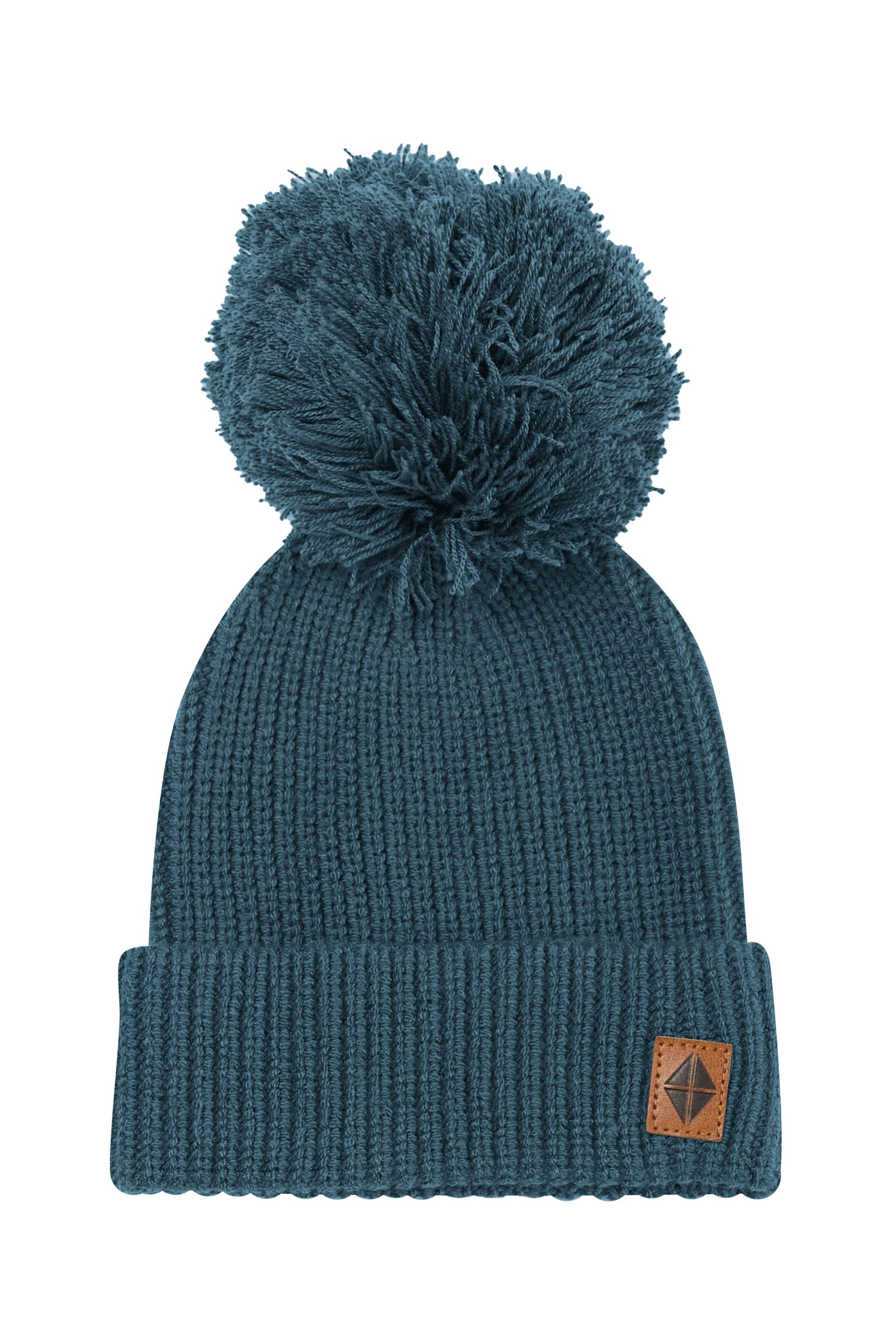 Product photo of the Chunky Knit Pom Beanie in Atlantic with the Kyte Baby vegan leather tag visible