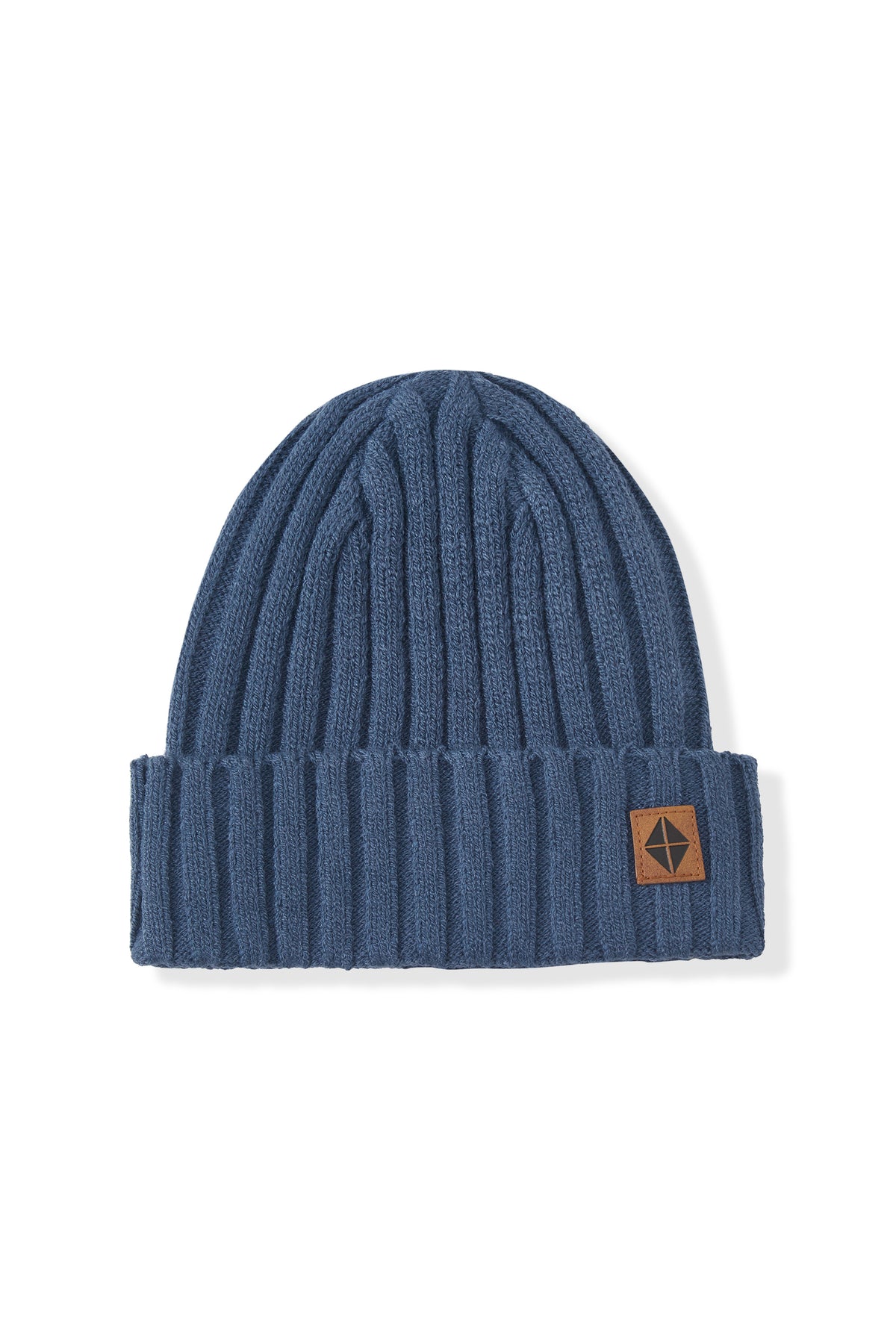 A ribbed knit beanie hat in a muted slate blue color, featuring a small brown leather patch on the folded cuff with a black compass rose logo, set against a plain white background.