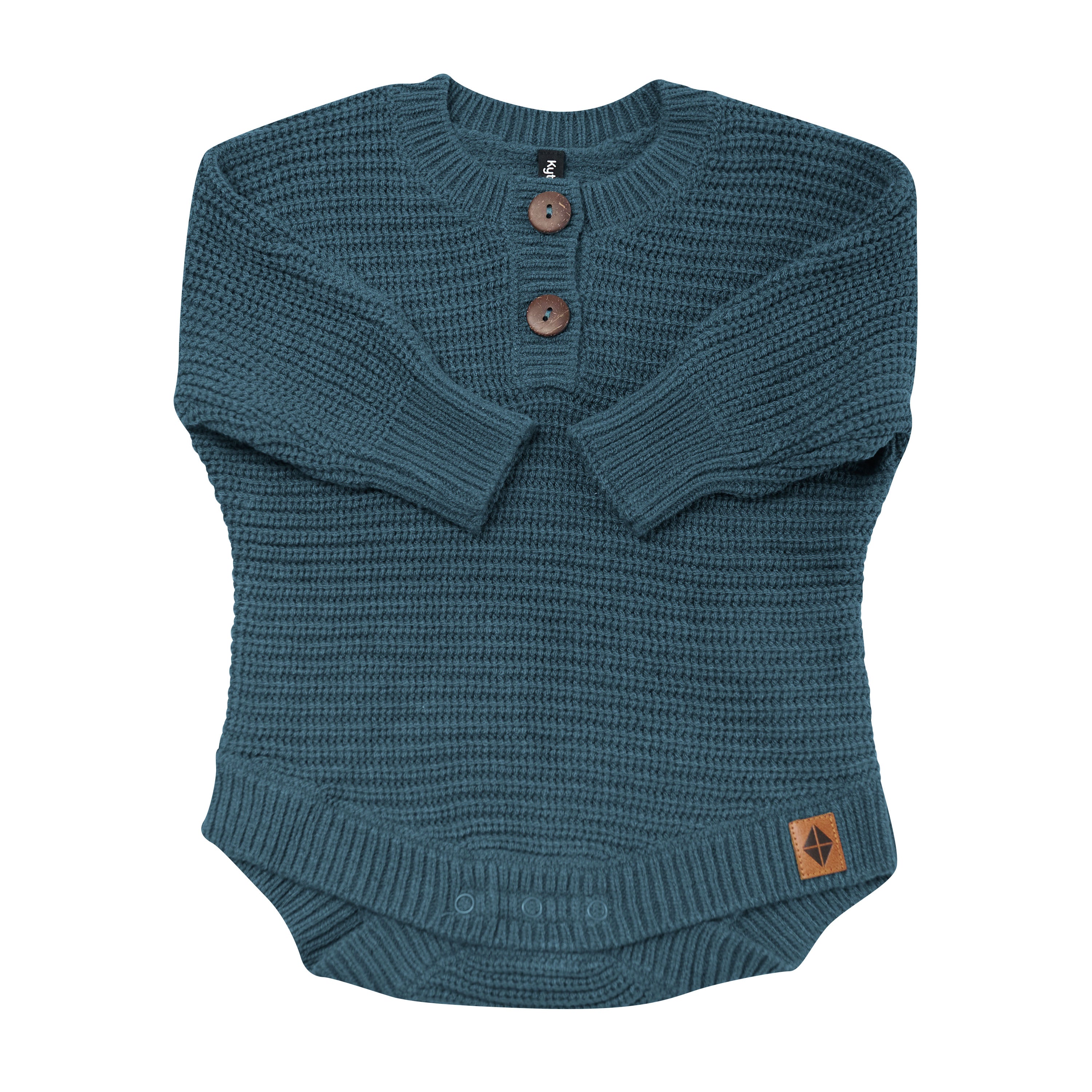 Chunky Knit Romper in Atlantic shown with the arms folded inwards