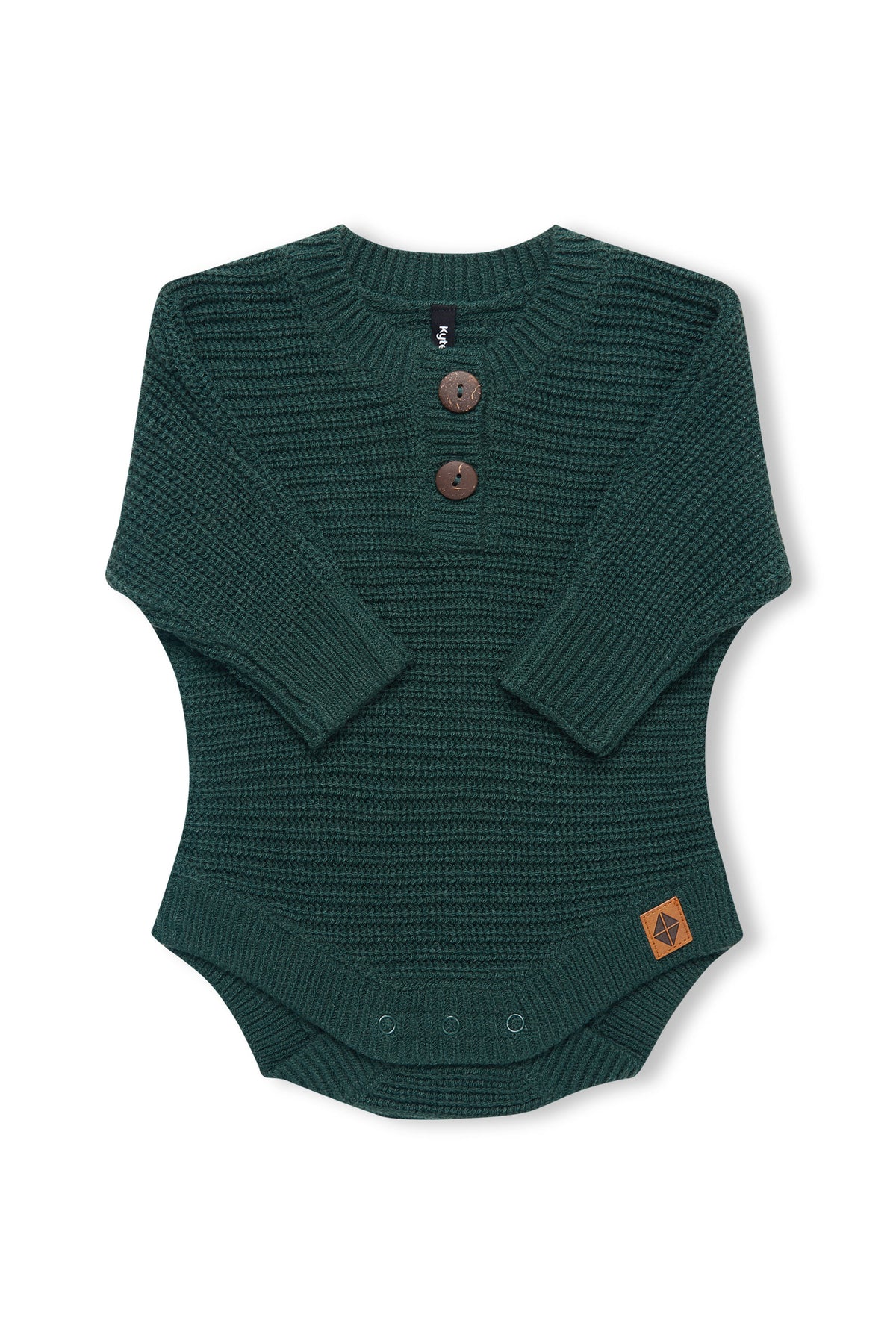 Chunky Knit Romper in cypress with folded sleeves on a white background
