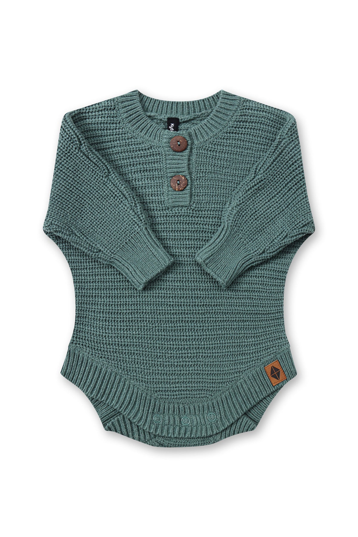 Chunky Knit Romper in Pine with folded sleeves on a white background