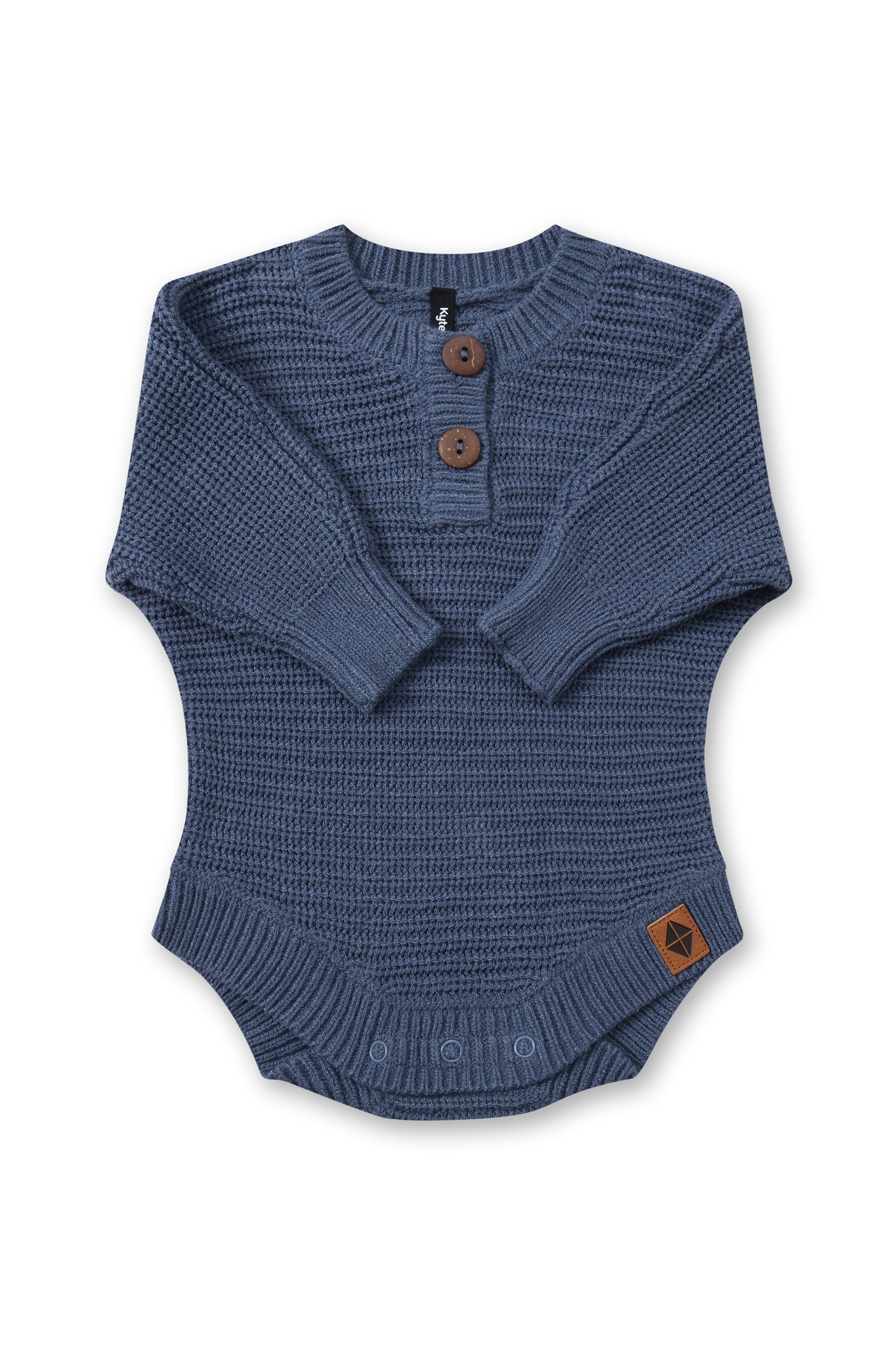 Chunky Knit Romper in Oxford with folded sleeves on a white background
