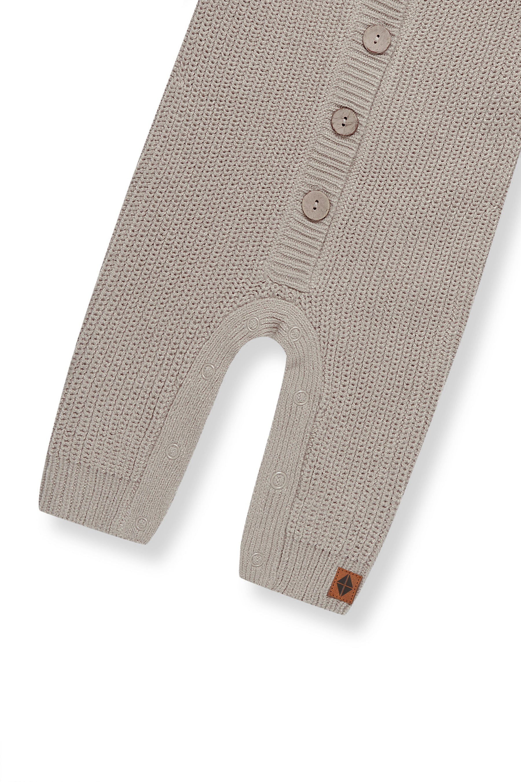Bottom part of Chunky Knit Jumpsuit in Almond on a white background