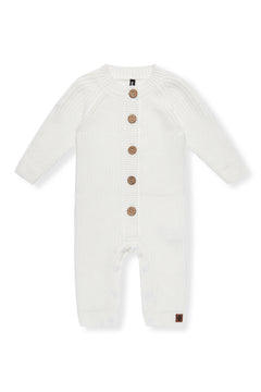 Chunky Knit Jumpsuit in Cloud with buttons on a white background