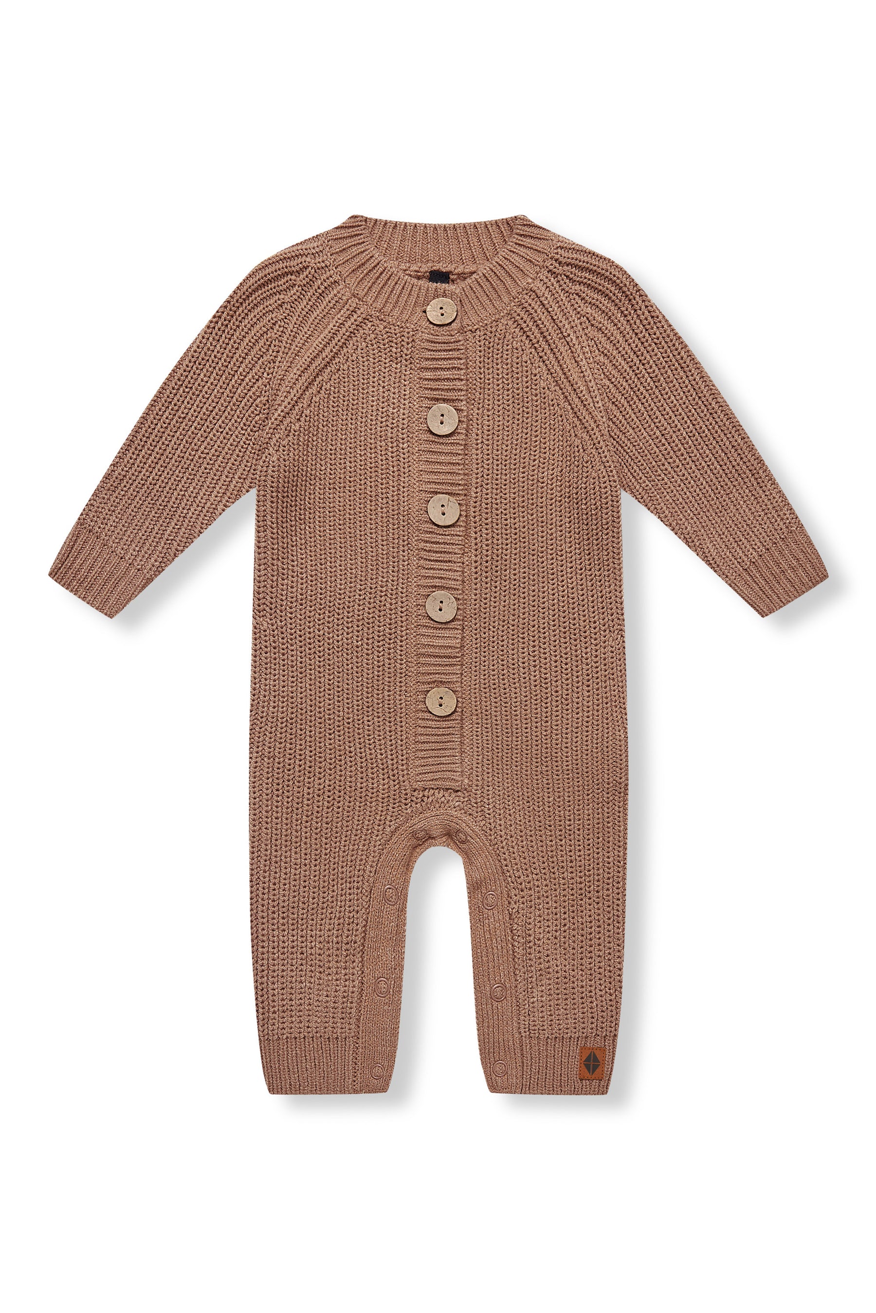 Chunky Knit Jumpsuit in latte with buttons on a white background