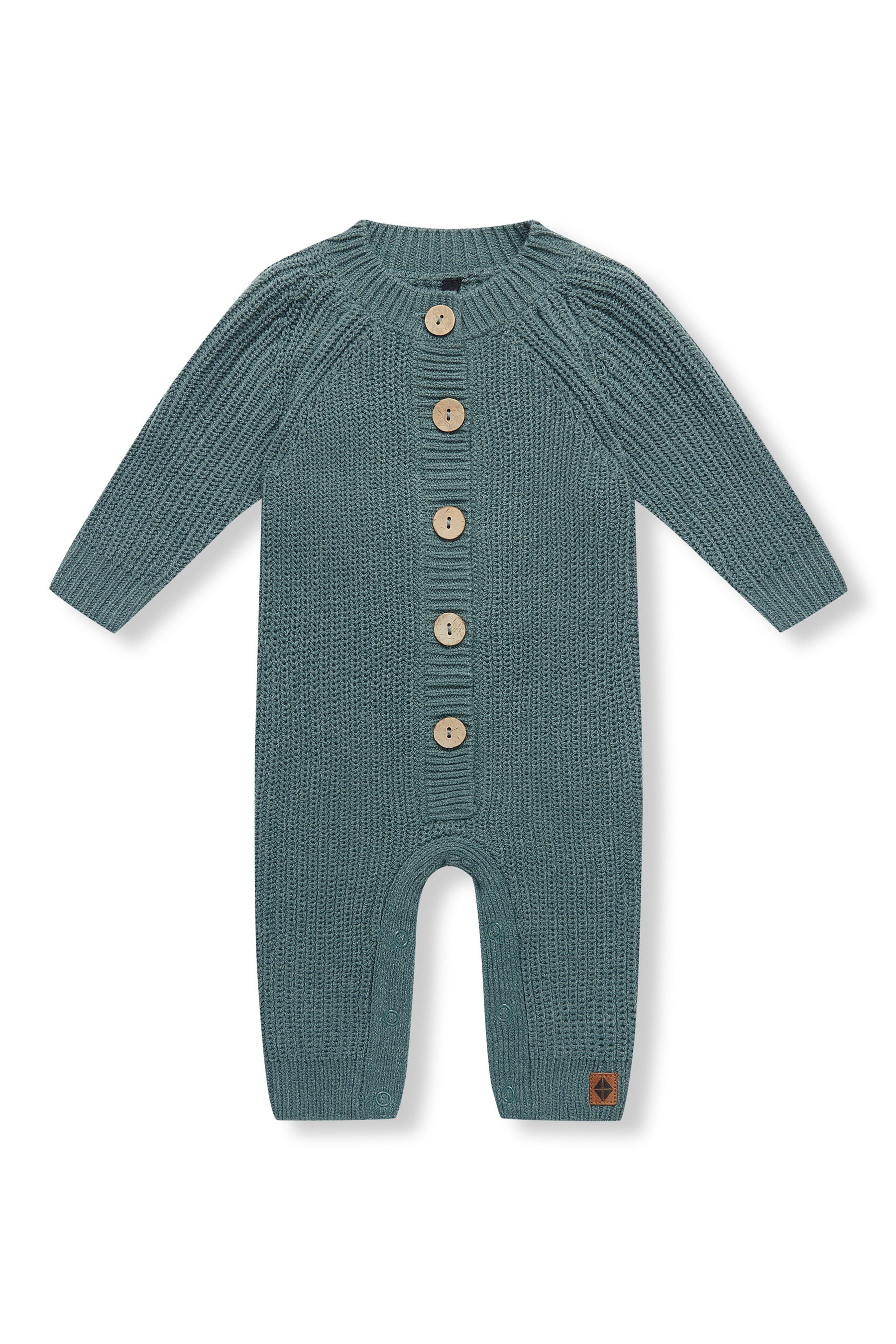 Chunky Knit Jumpsuit in Pine with buttons on a white background