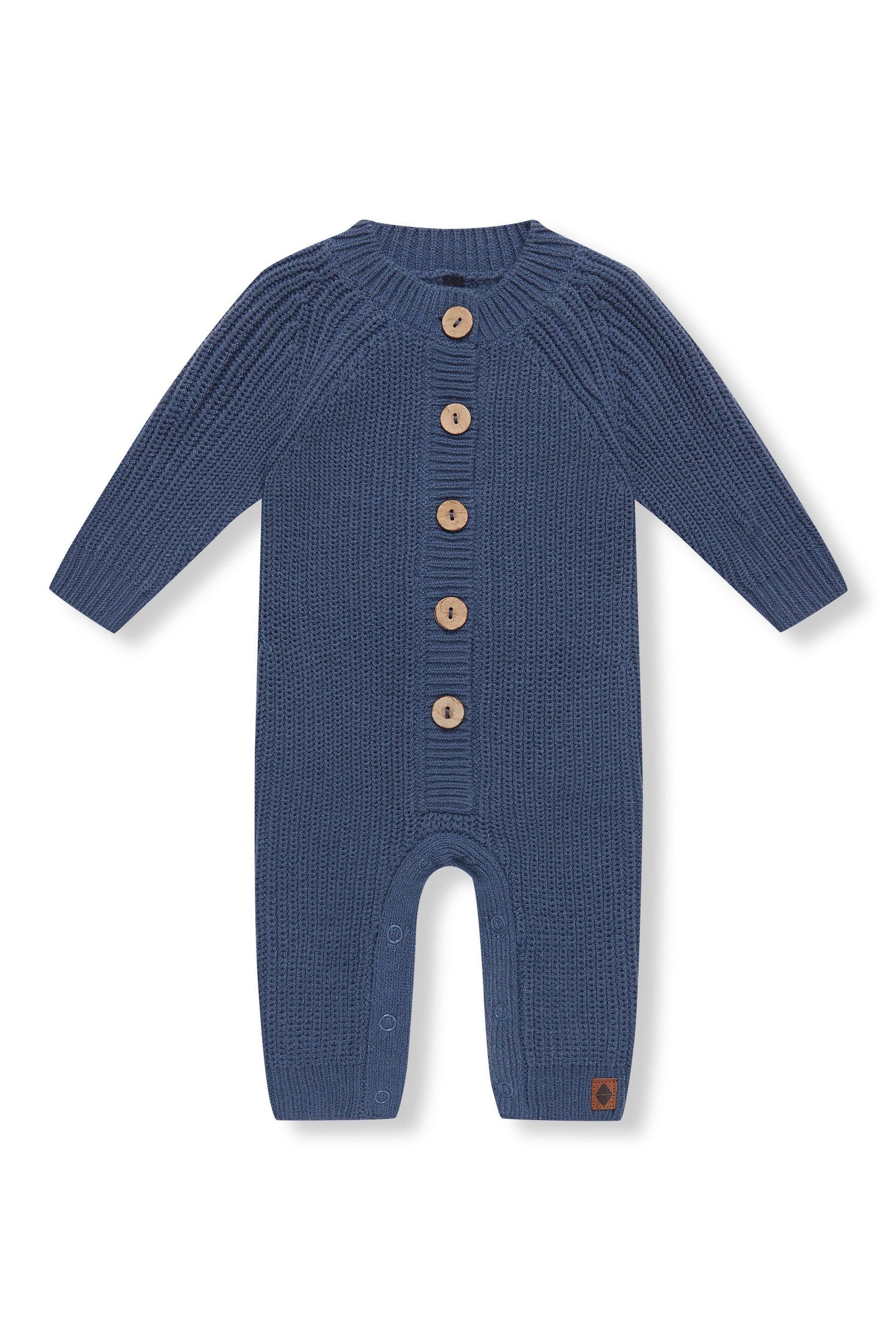 Chunky Knit Jumpsuit in oxford with buttons on a white background