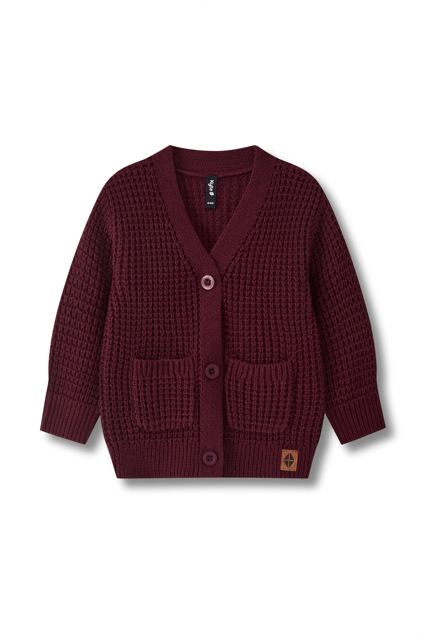 A burgundy textured knit cardigan sweater with a V-neck, three buttons, and two front patch pockets, shown flat on a white background.