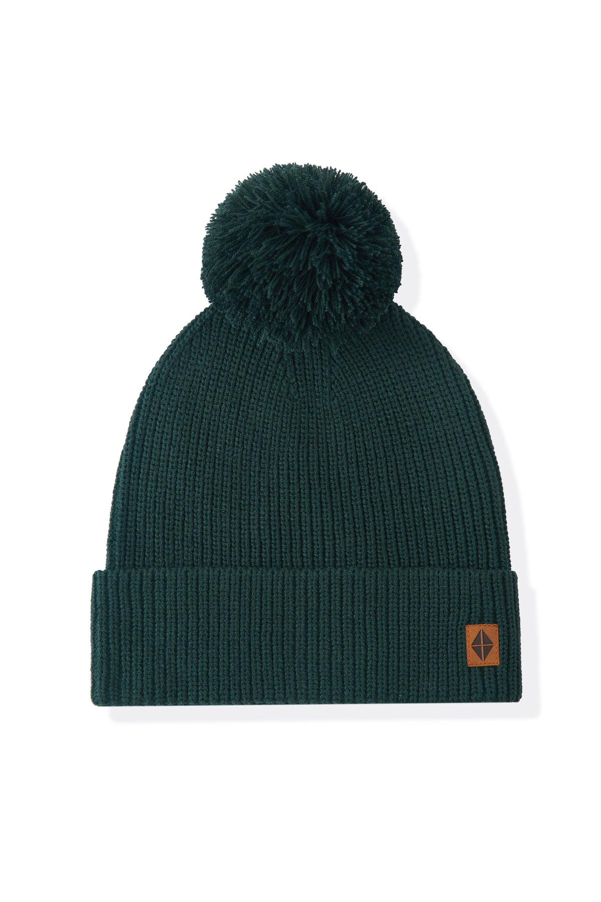 Dard green knit beanie with pom on a white background