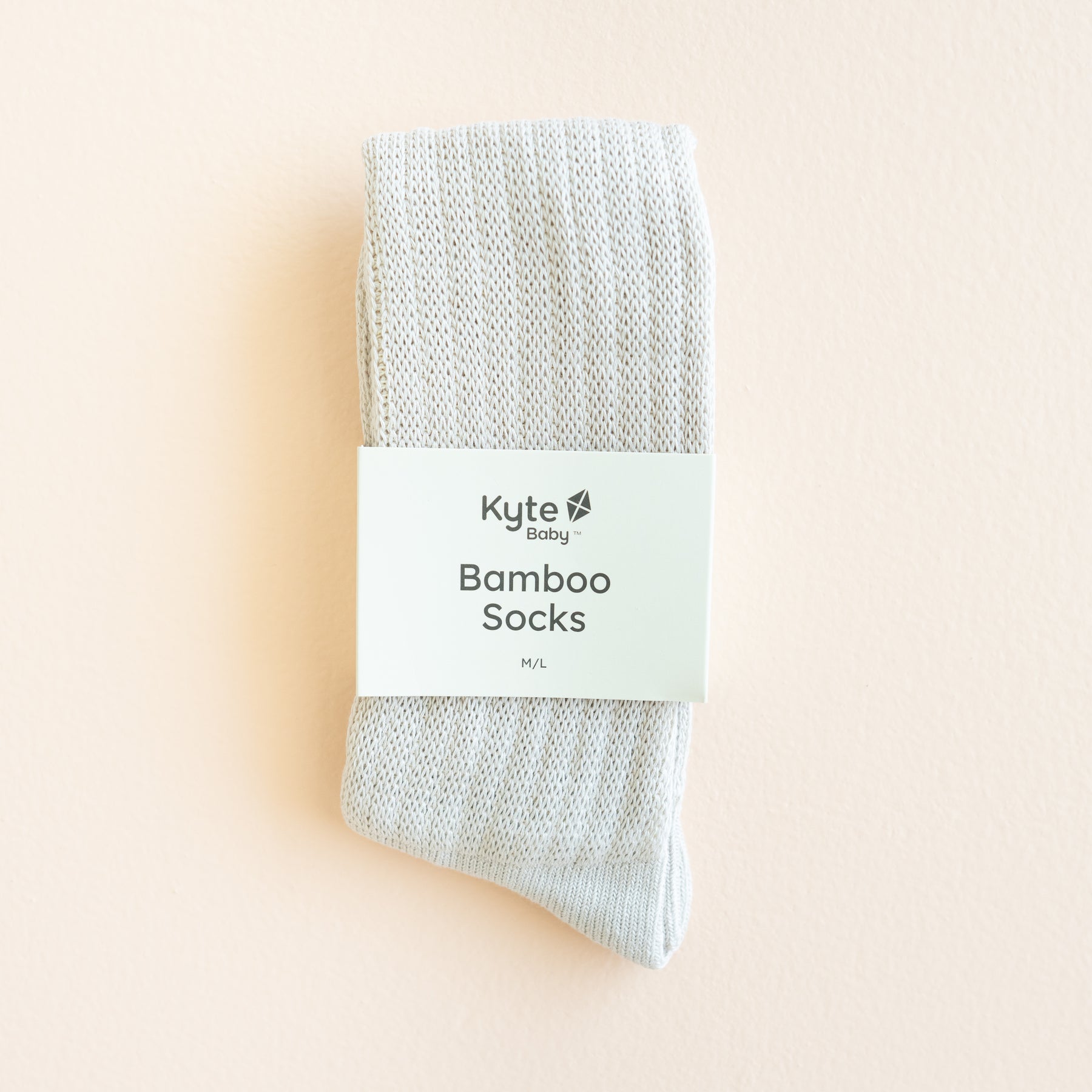 Adult Scrunch Socks in Oat shown in its packaging