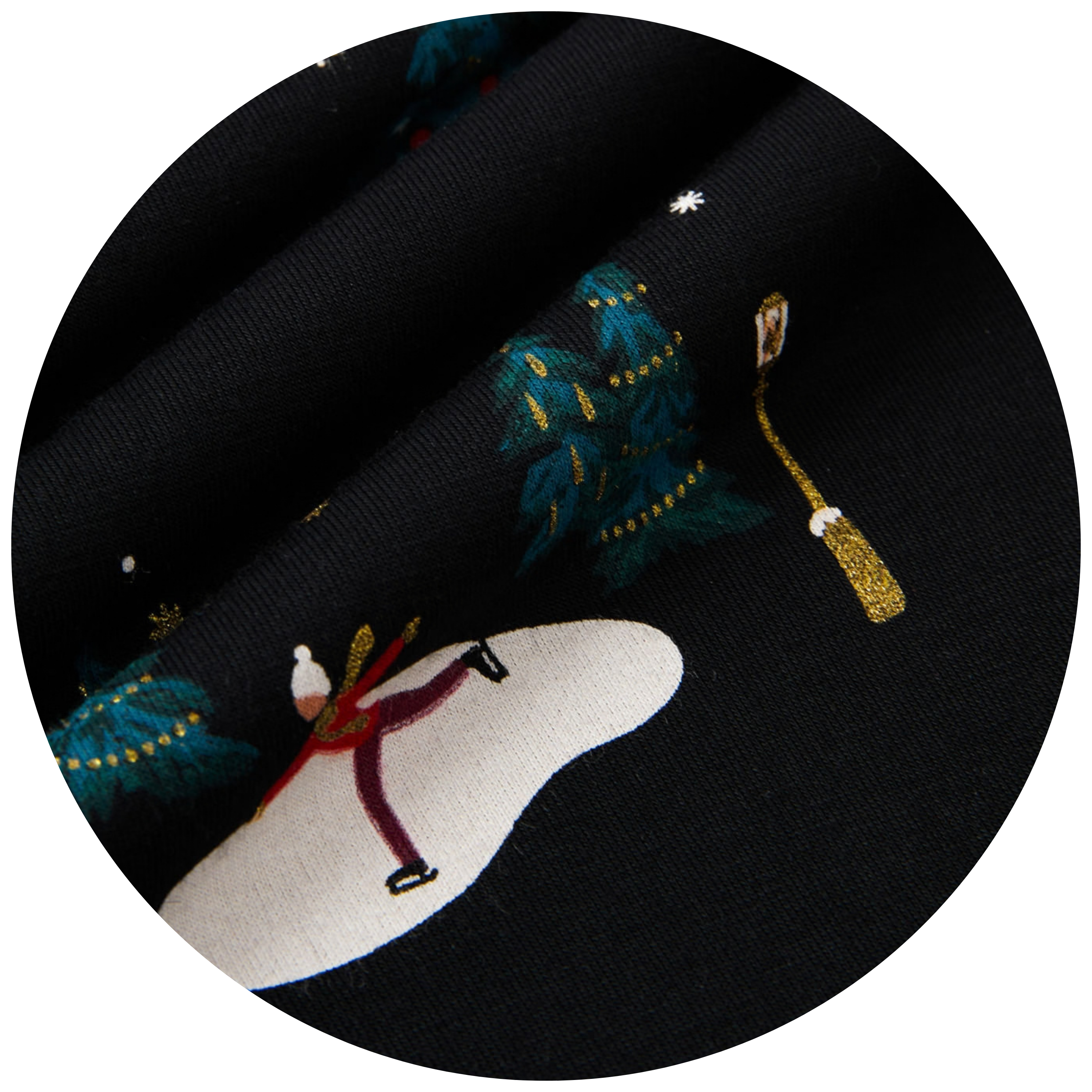 swatch of black fabric with winter elements including trees, light post, ice skater