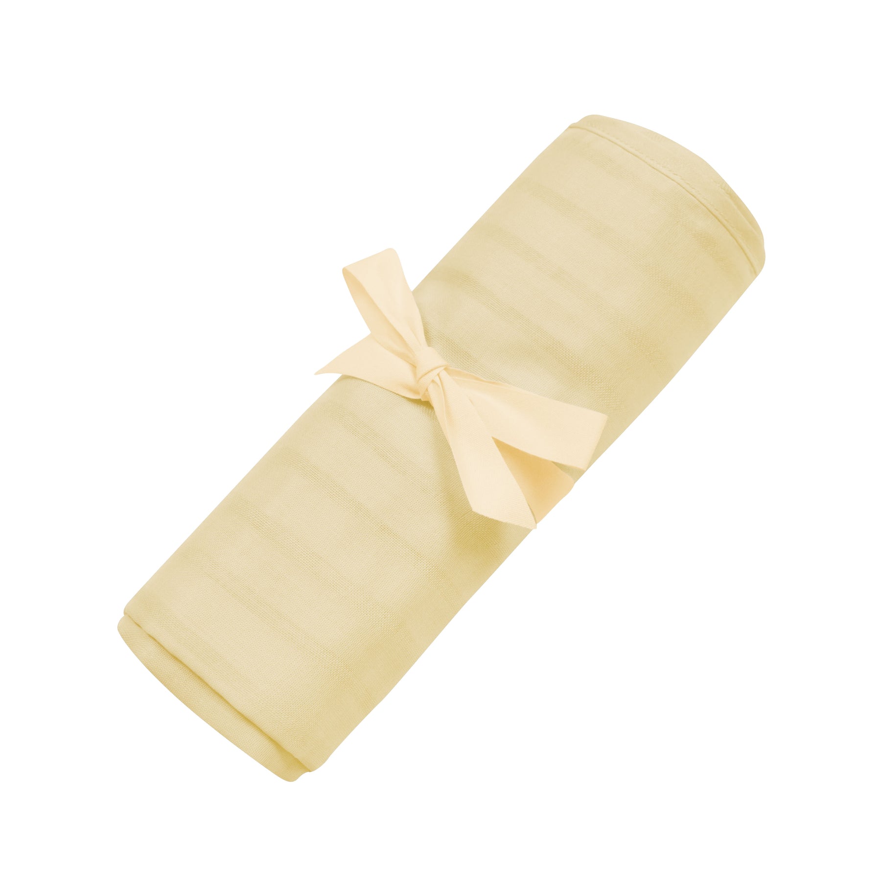 Bamboo Muslin Swaddle Blanket in Wheat folded with bow