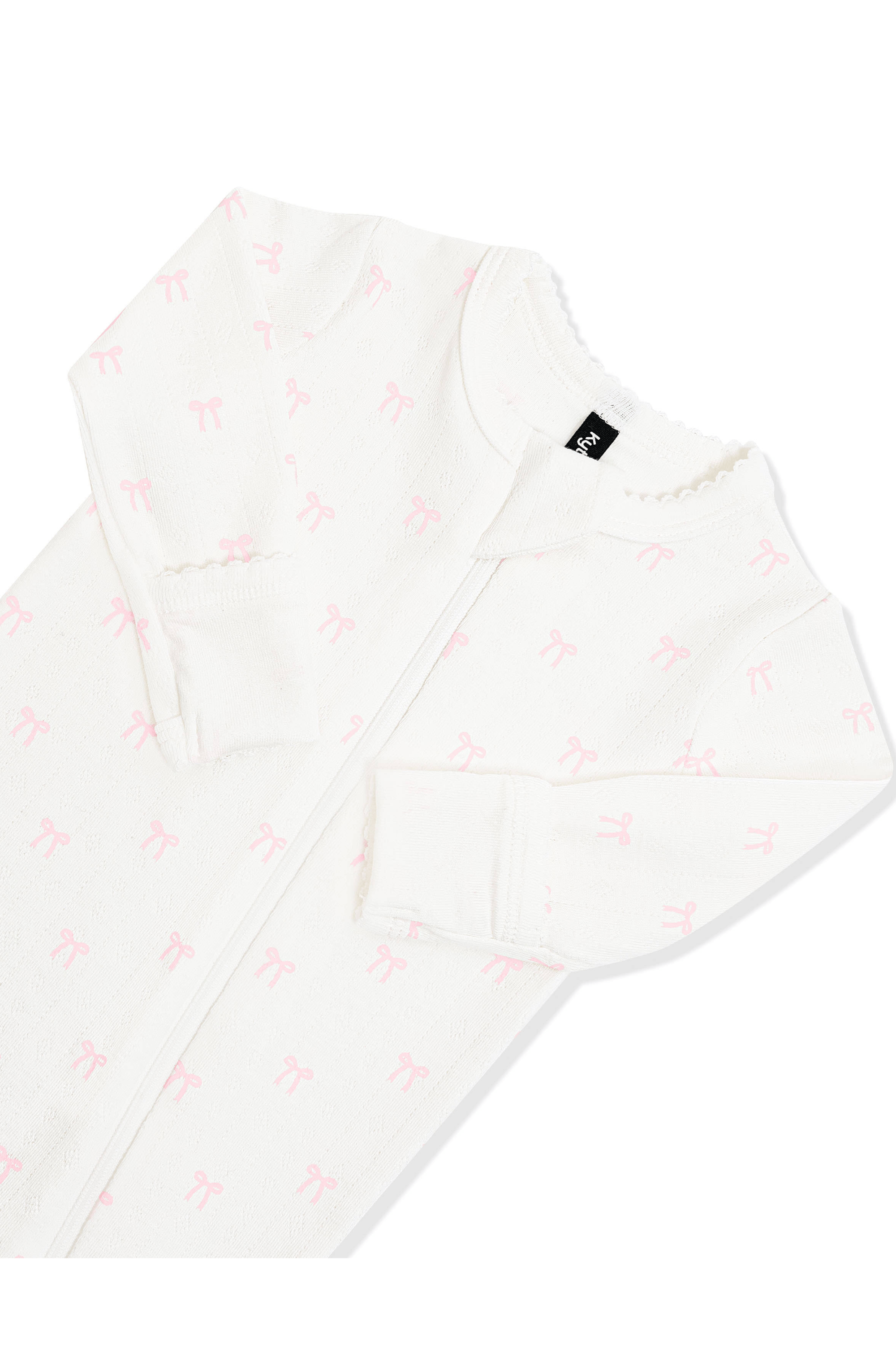 Close up of the picot trim, zipper garage and fold over hand cuffs on the Pointelle Zippered Footie in Sweet Pink Bow