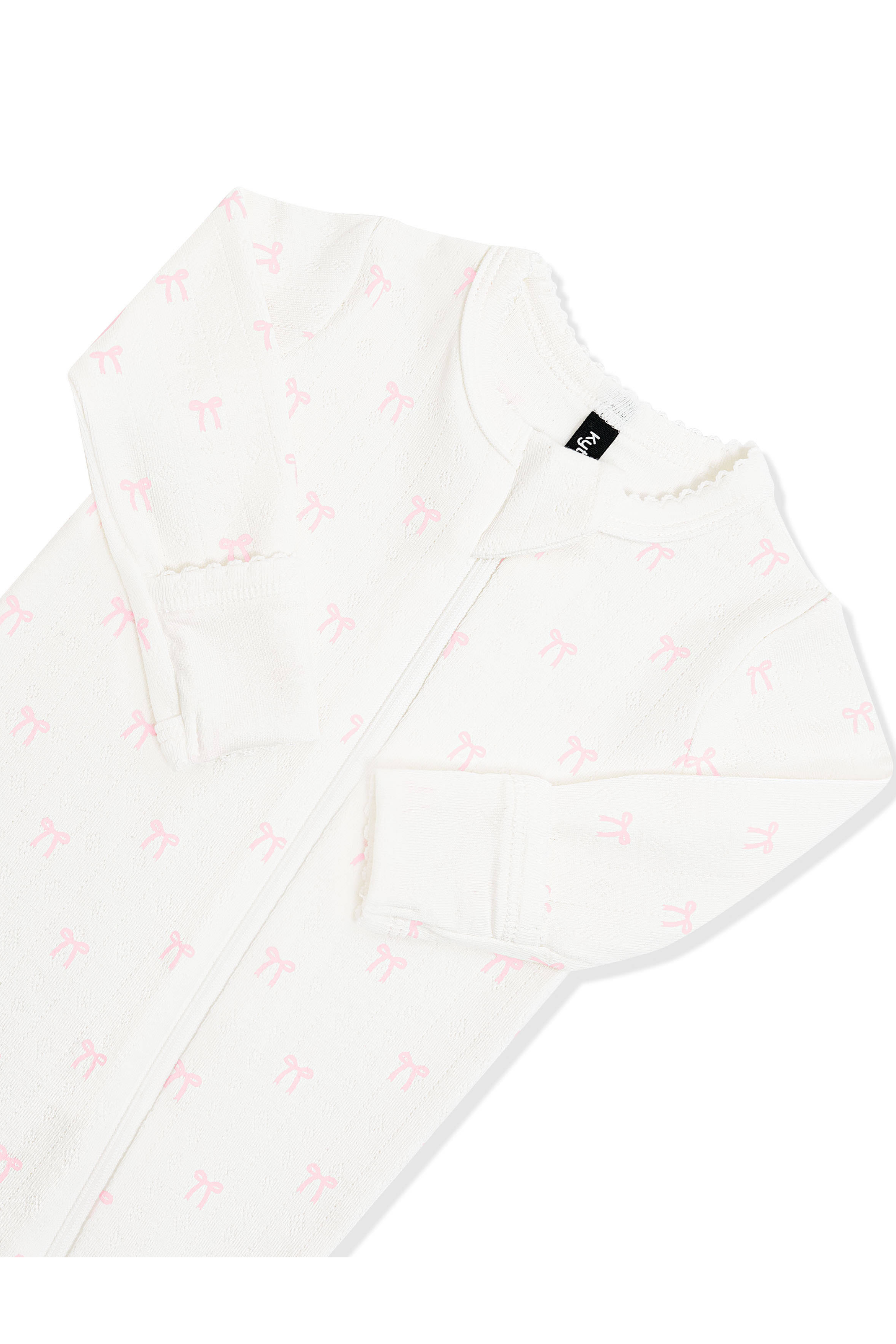 Close up of the picot trim, zipper garage and fold over hand cuffs on the Pointelle Zippered Footie in Sweet Pink Bow