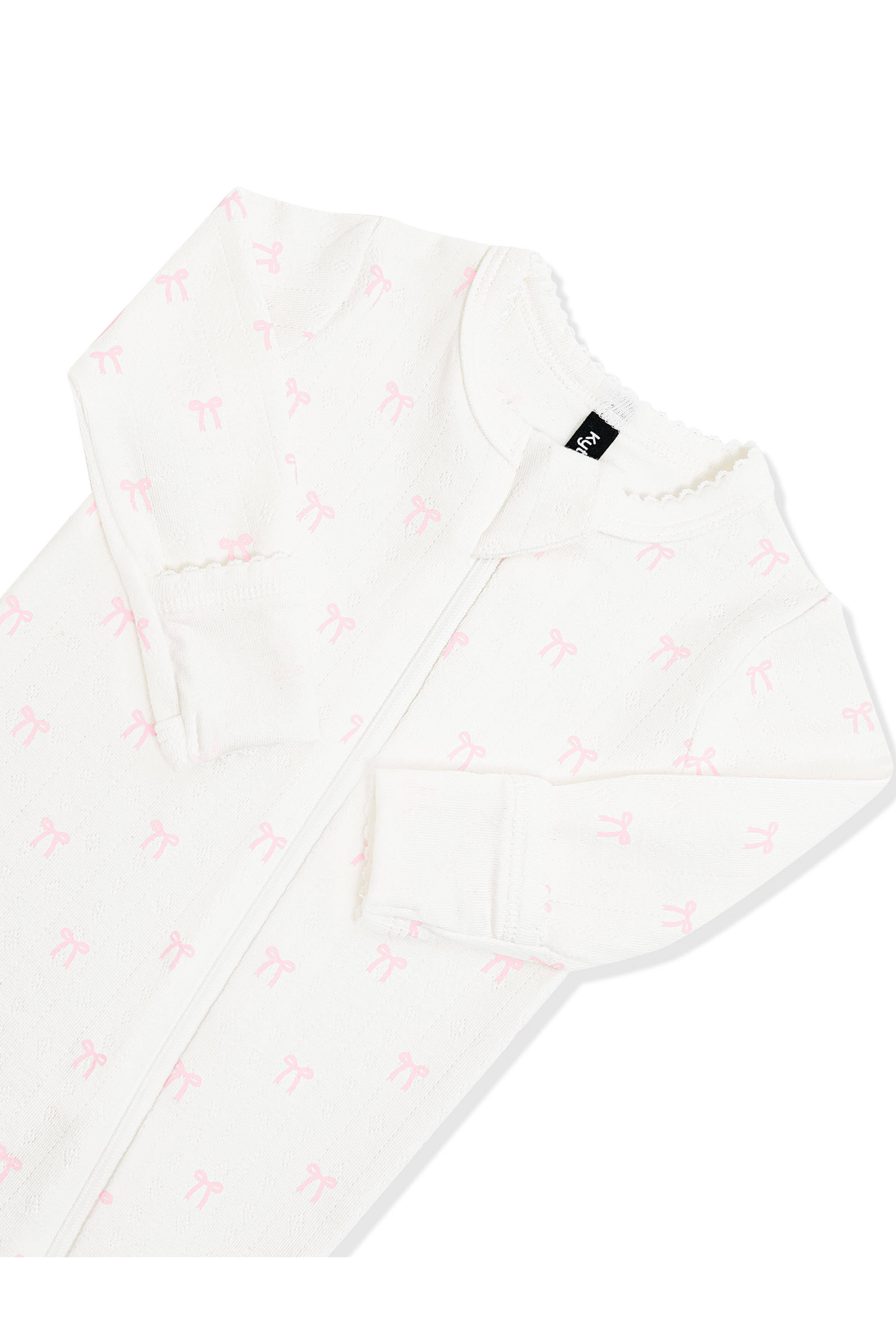 Close up of the picot trim, zipper garage and fold over hand cuffs on the Pointelle Zippered Footie in Sweet Pink Bow