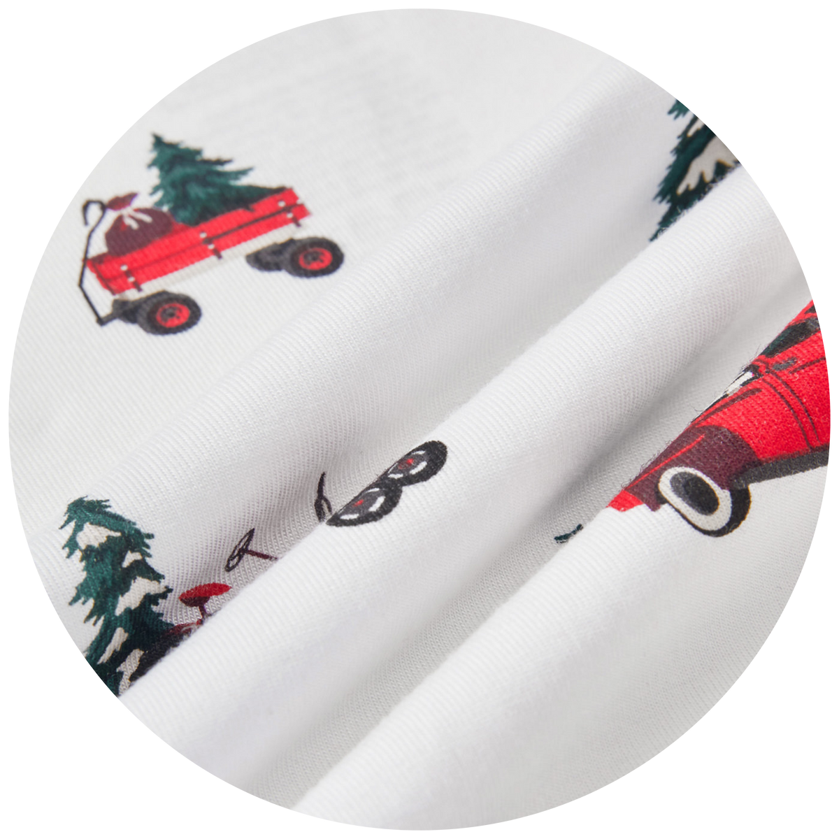 swatch of white fabric with red vehicles and christmas treees