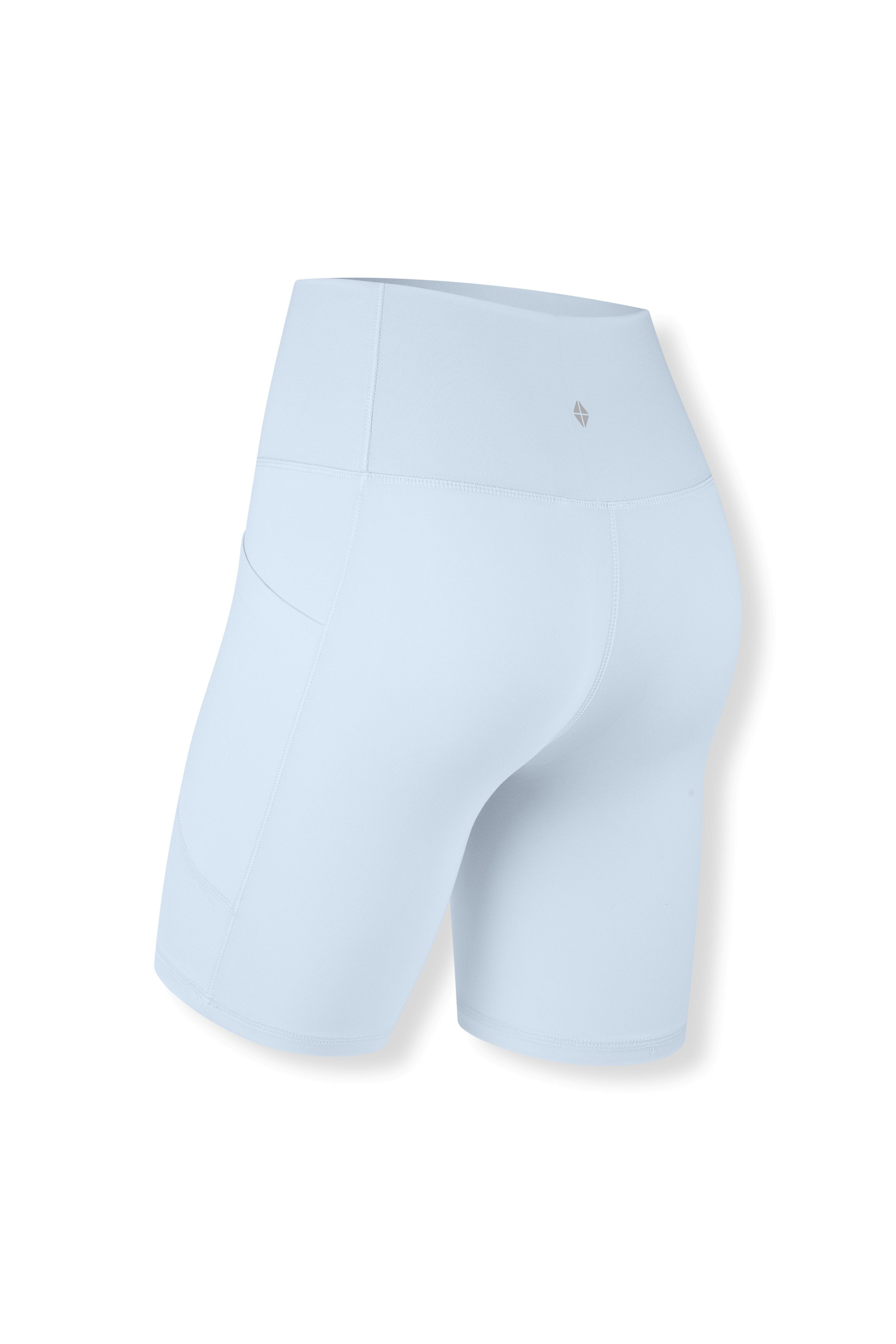 The back of the Bamboo Flex High Rise Biker Short in Breeze shown on a ghost mannequin