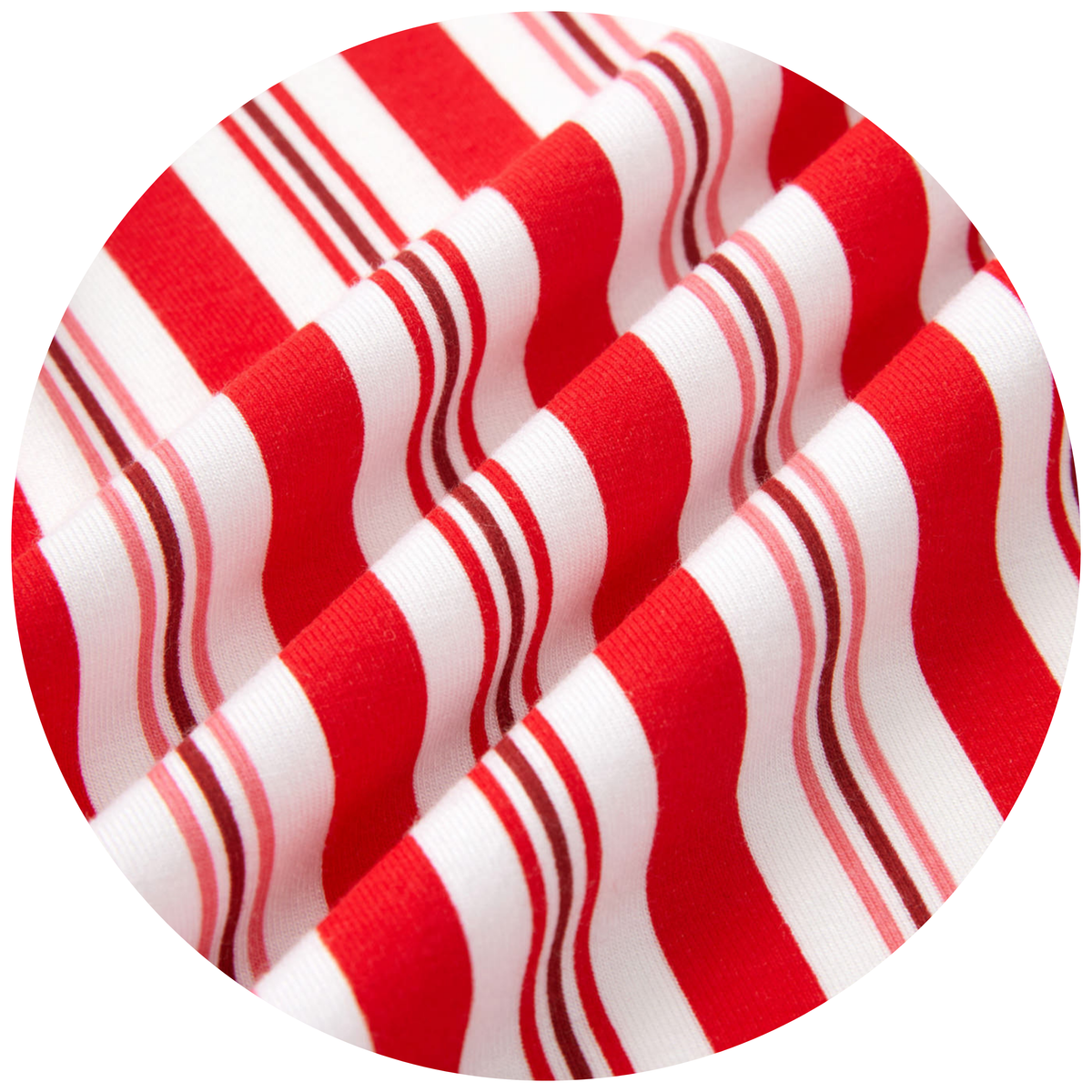 A close-up circular view of a red and white striped fabric with wavy bands and thin dark accent lines, shown against a black background.