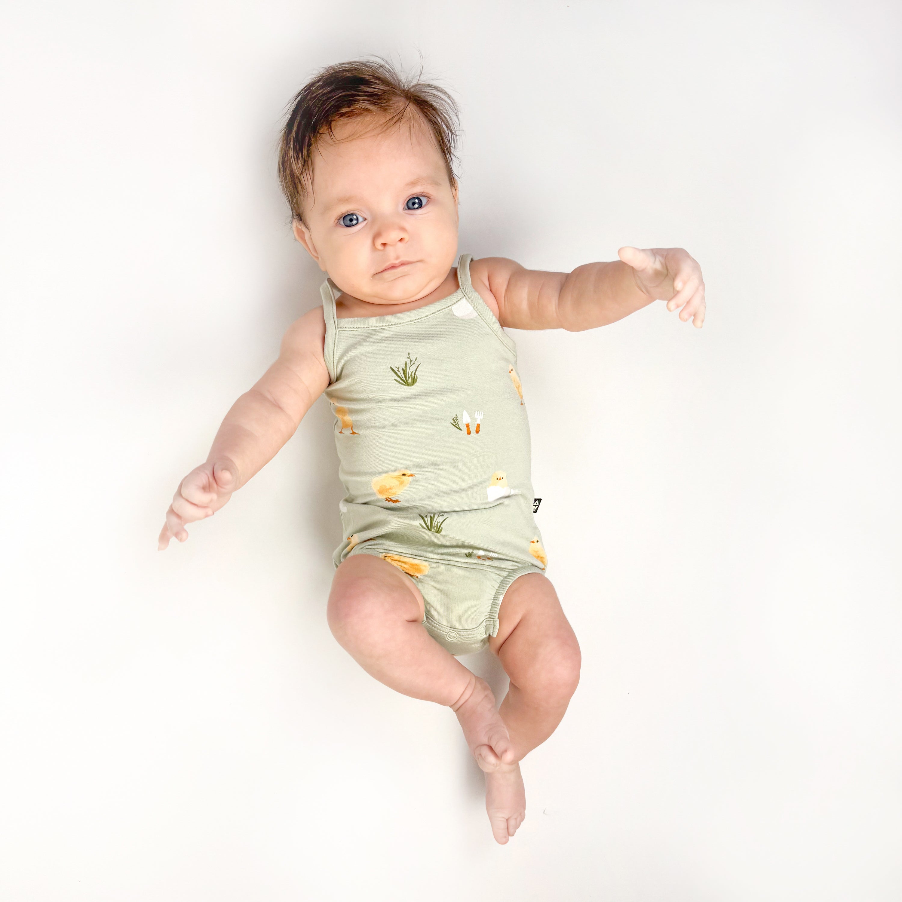 Baby in Spaghetti Strap Leotard in Aloe Chick