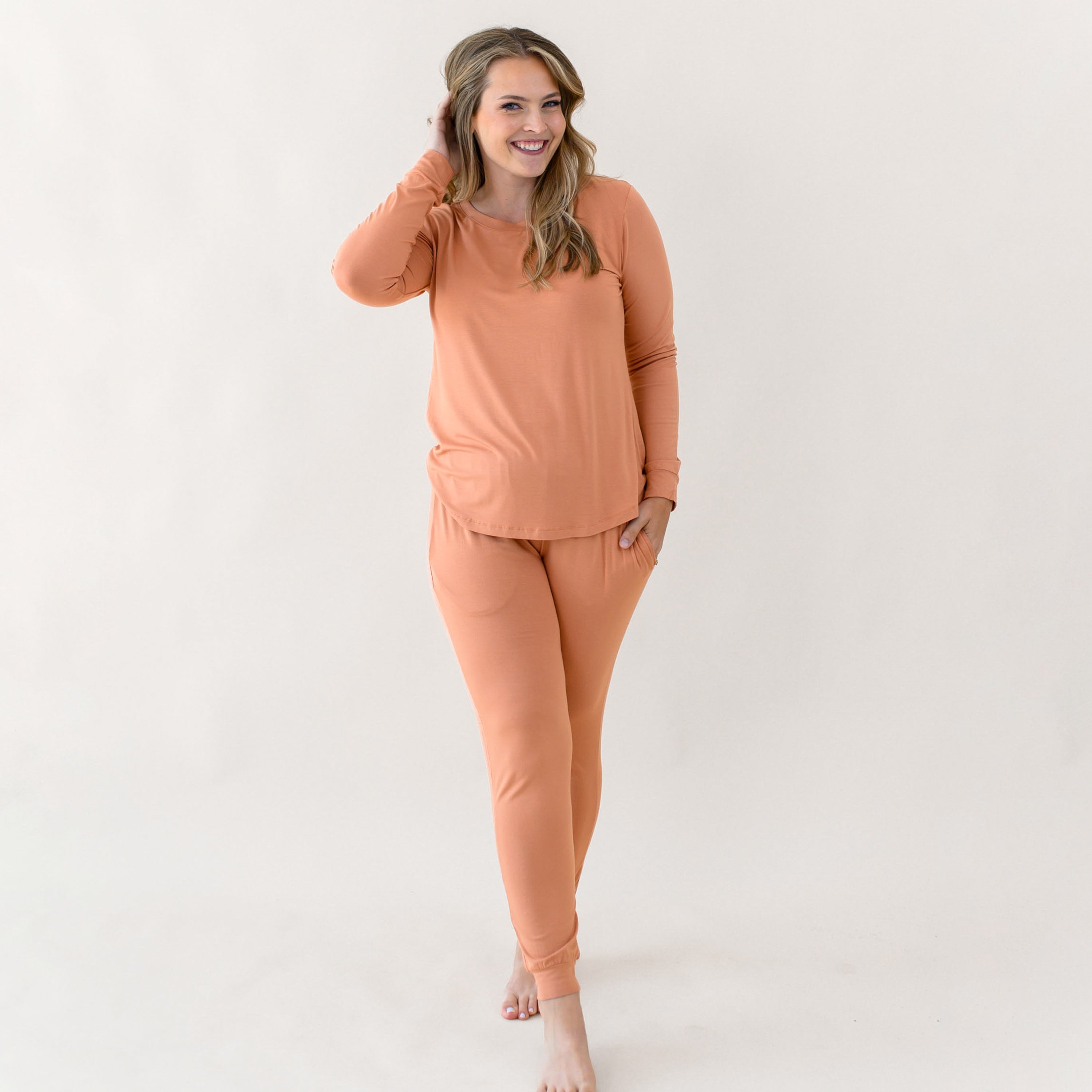 Woman wearing Women's Jogger Pajama Set in Apricot