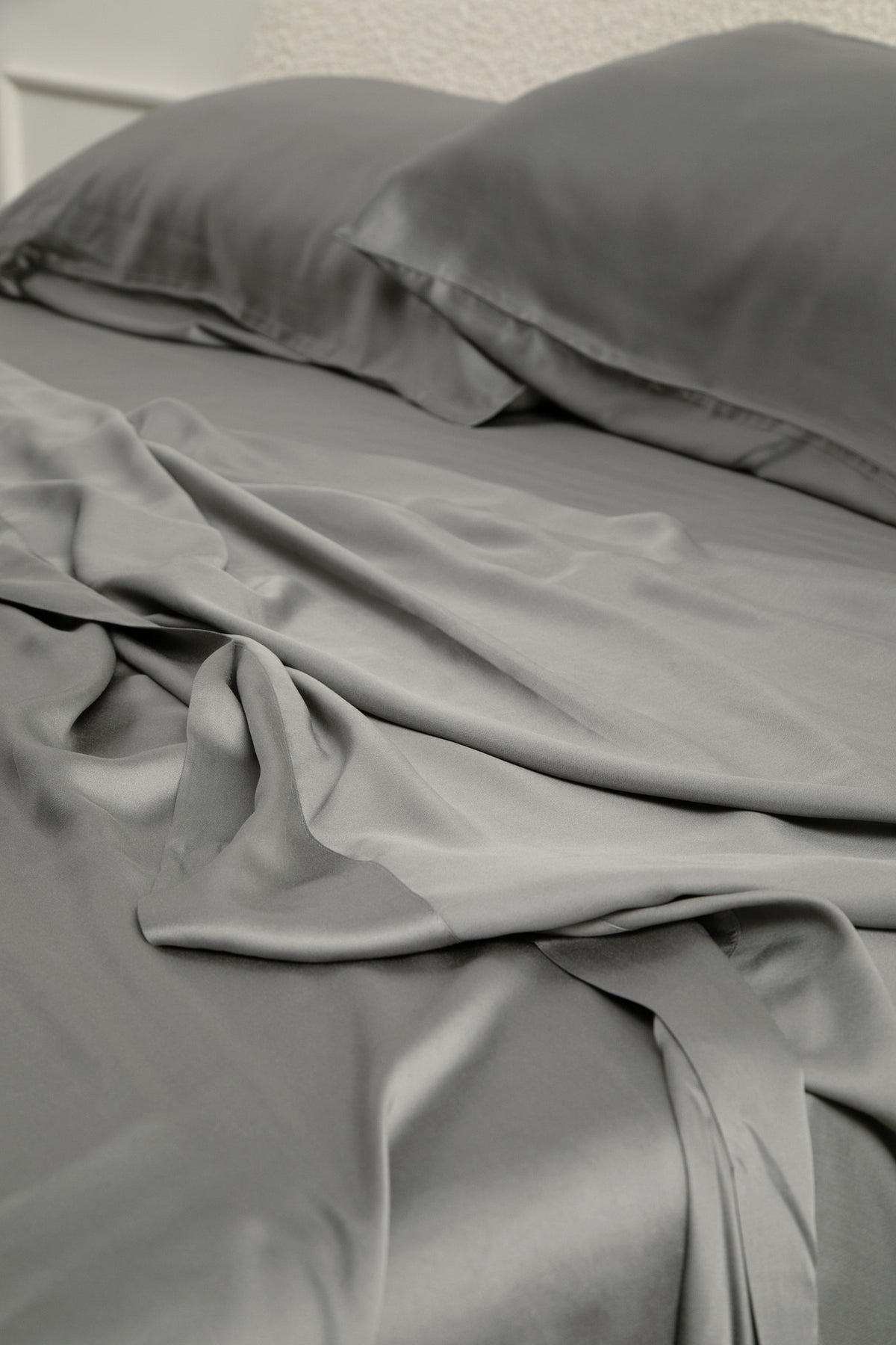 Bamboo Sateen Sheet Set in Ash shown on a bed