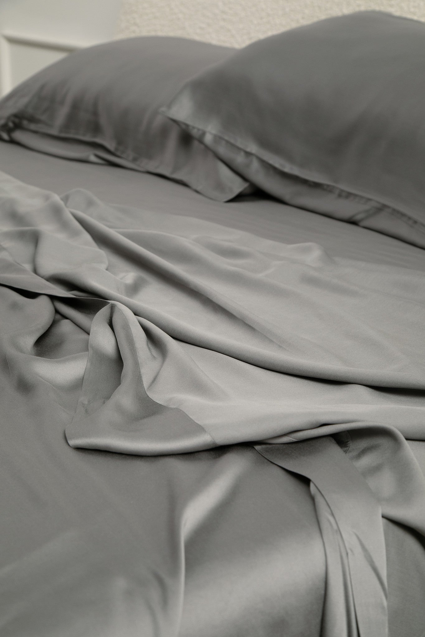Bamboo Sateen Sheet Set in Ash shown on a bed