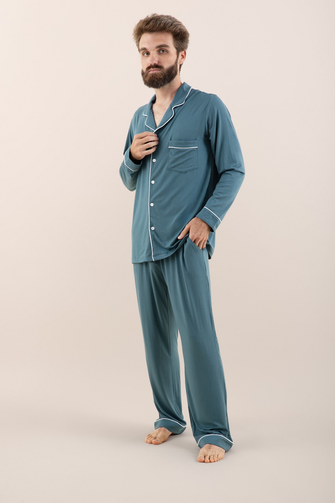 Male model wearing the Men's Long Sleeve Pajama Set in Atlantic