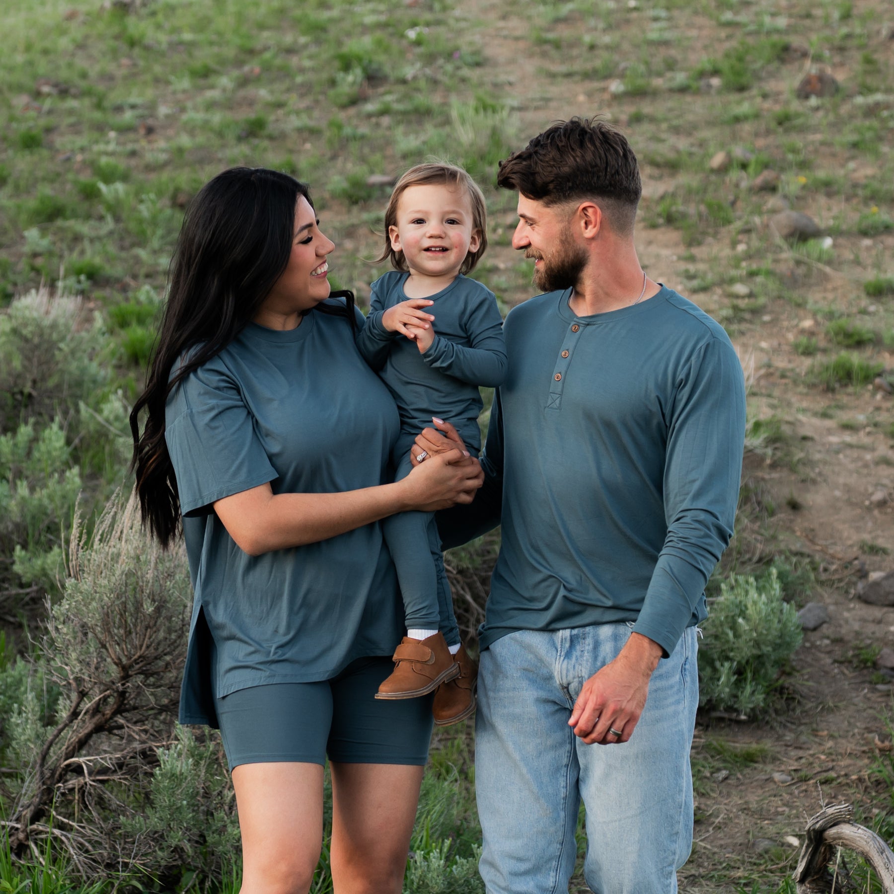 Family matching in Atlantic items. Pictured are the Women's Biker short set, toddler long sleeve pajamas and men's long sleeve henley top