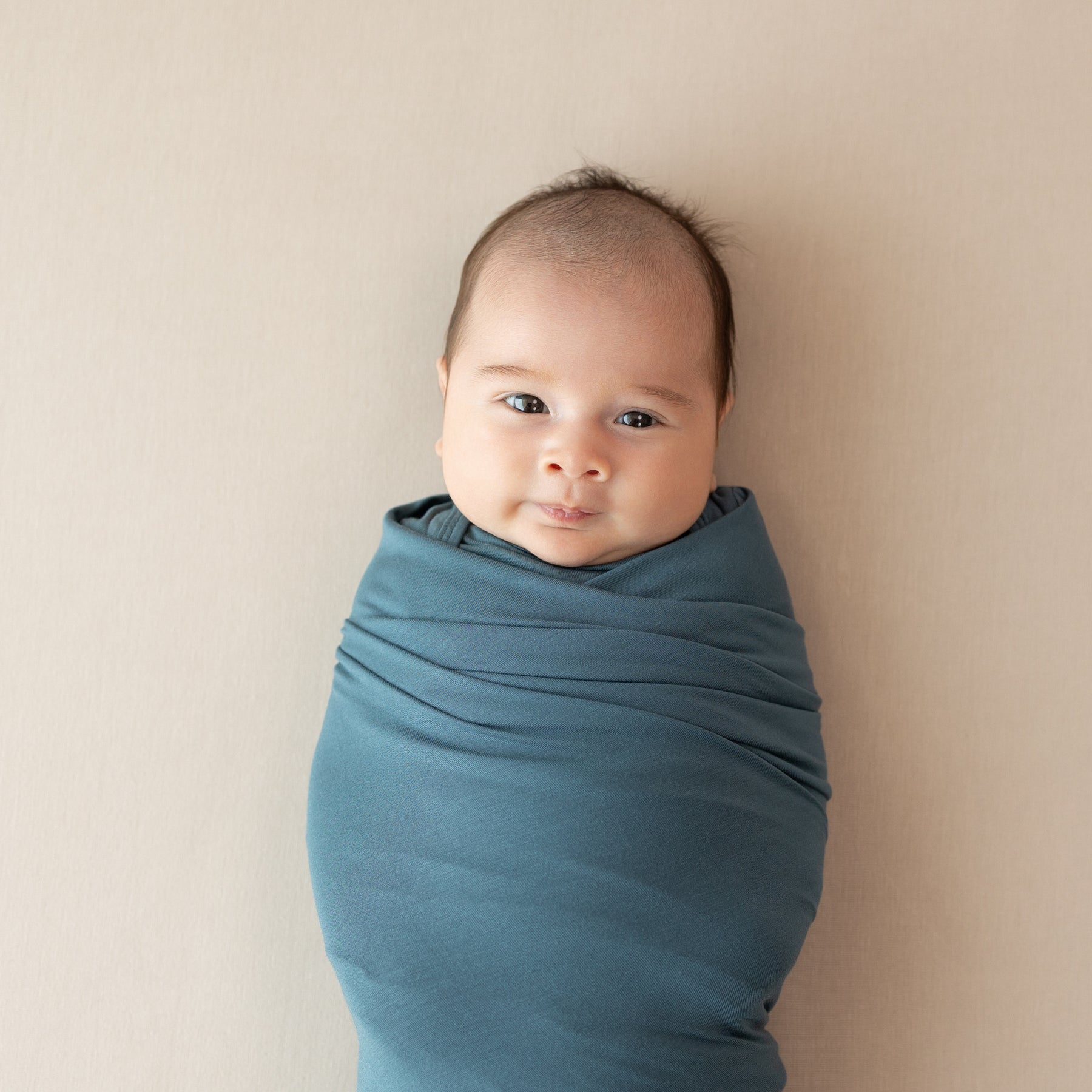 Close up of swaddled baby in the Swaddle Blanket in Atlantic