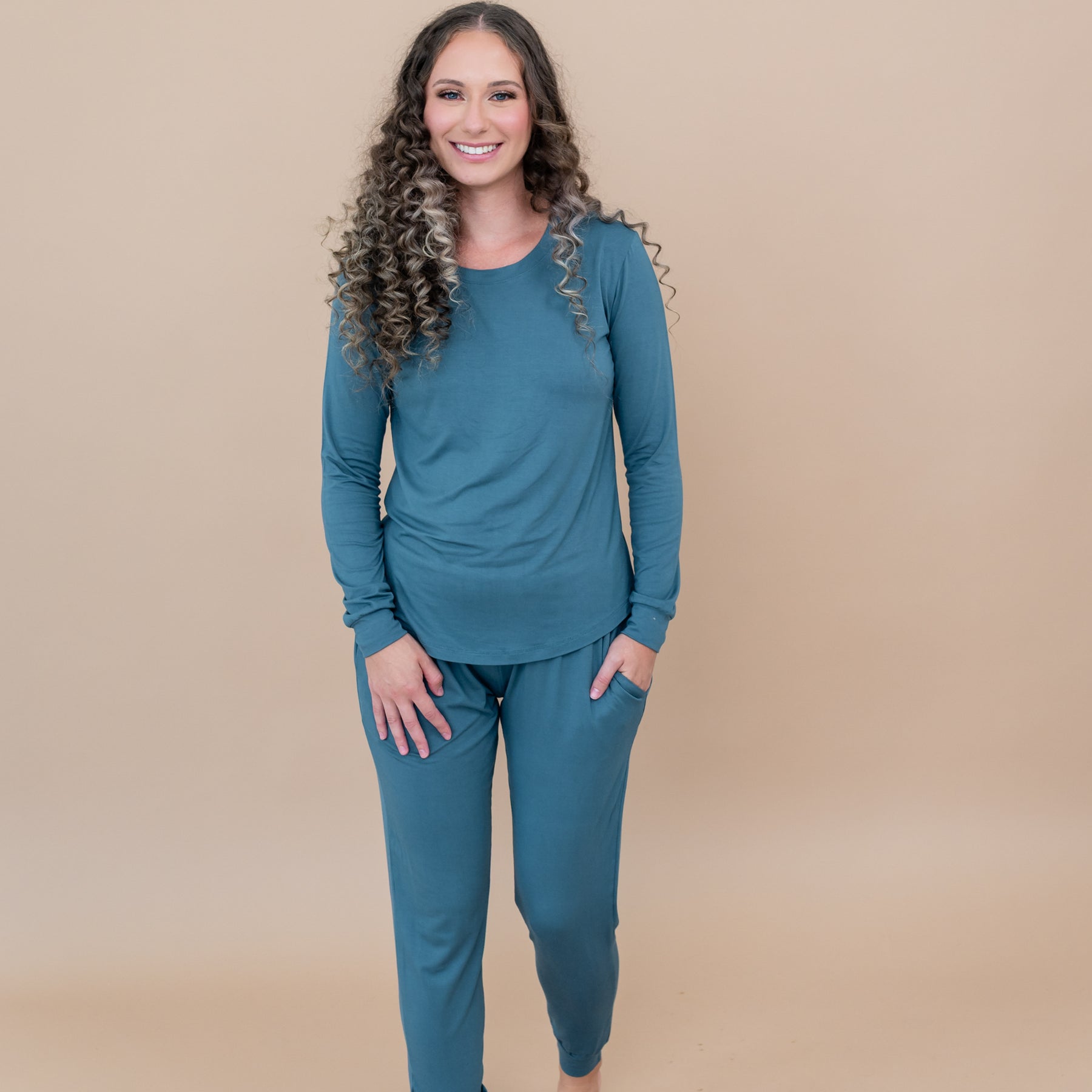 Female modeling the Women's Jogger Pajama Set in Atlantic with one hand in pants pocket