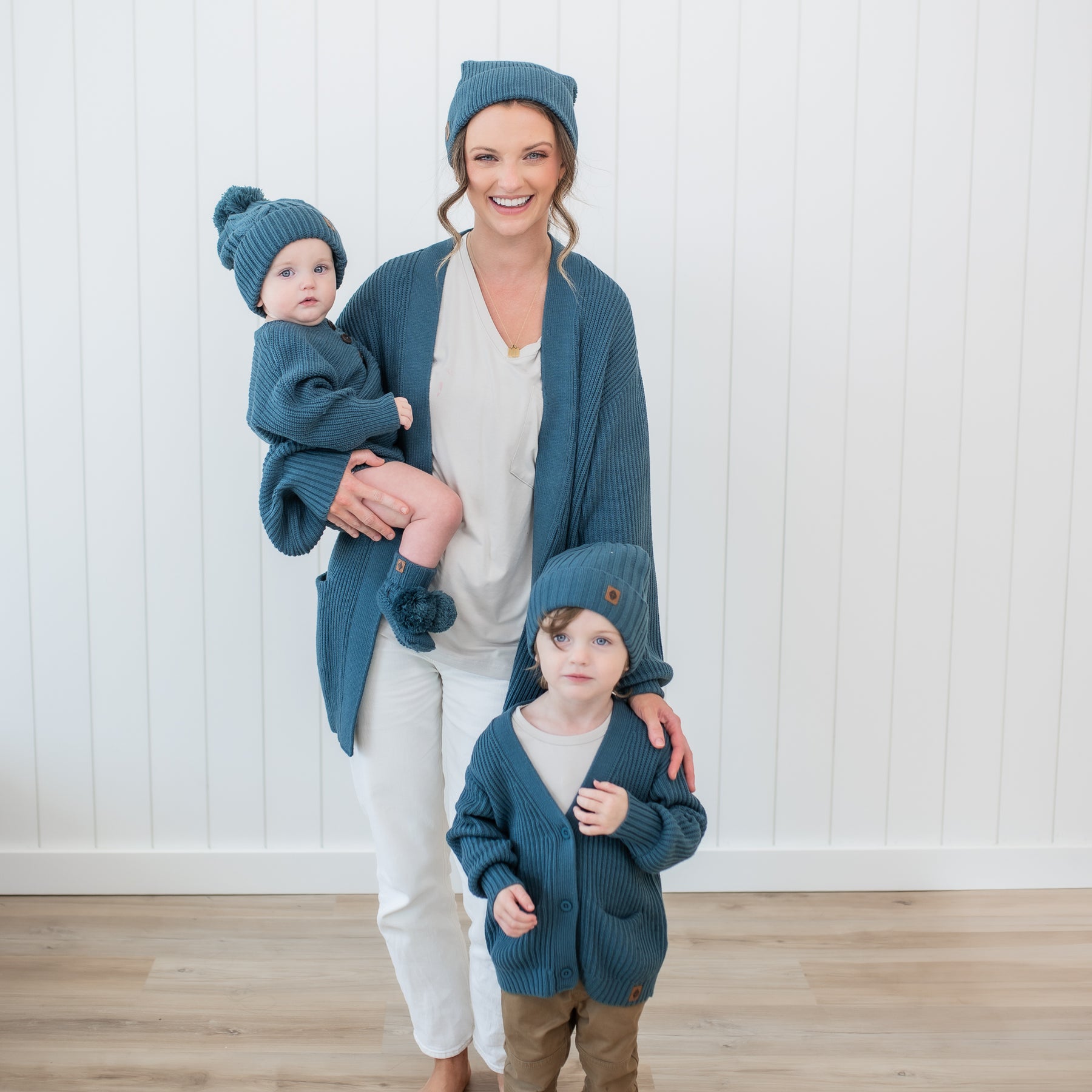 Family matching in various Chunky Knit items in the color Atlantic