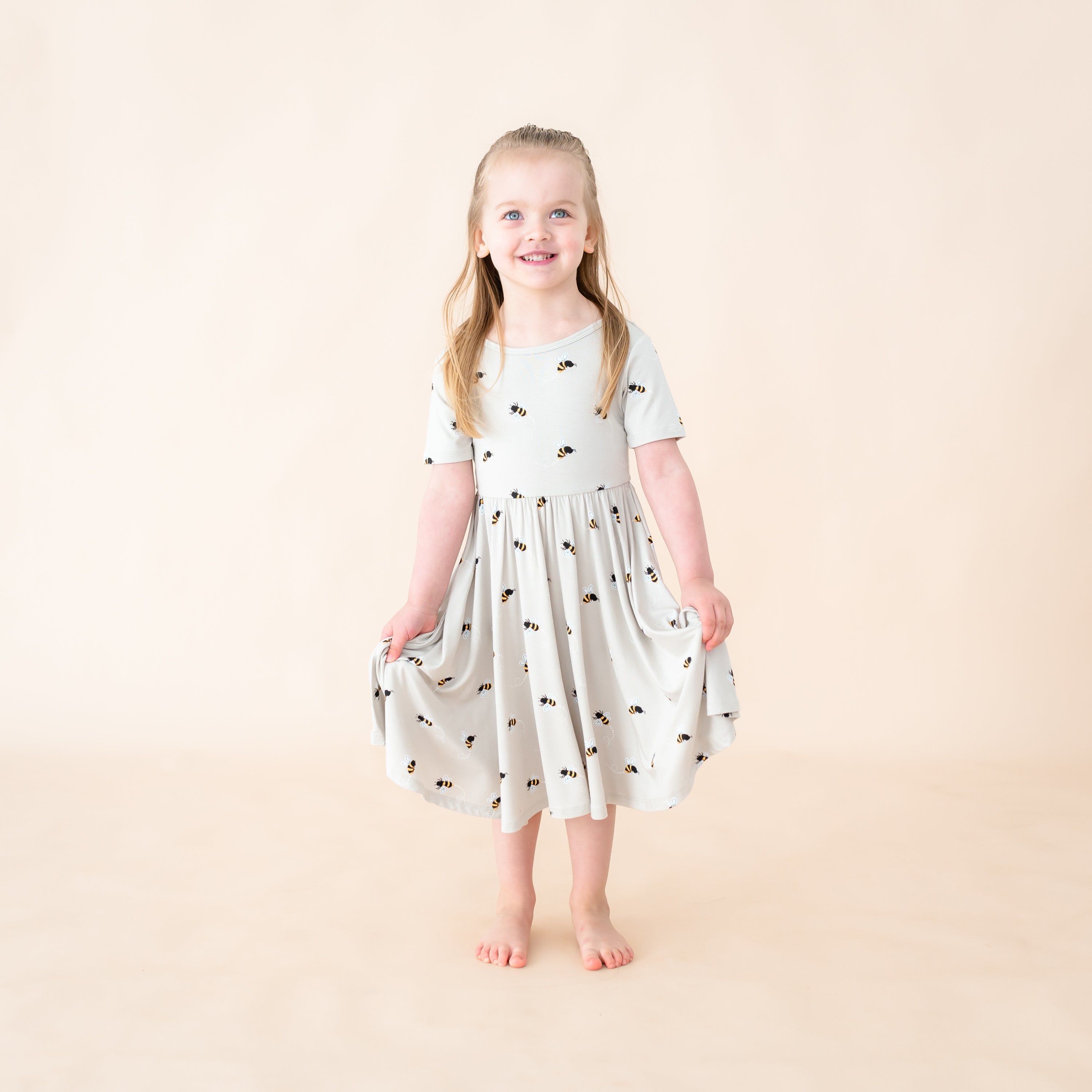 Toddler wearing Bee Mine twirl dress