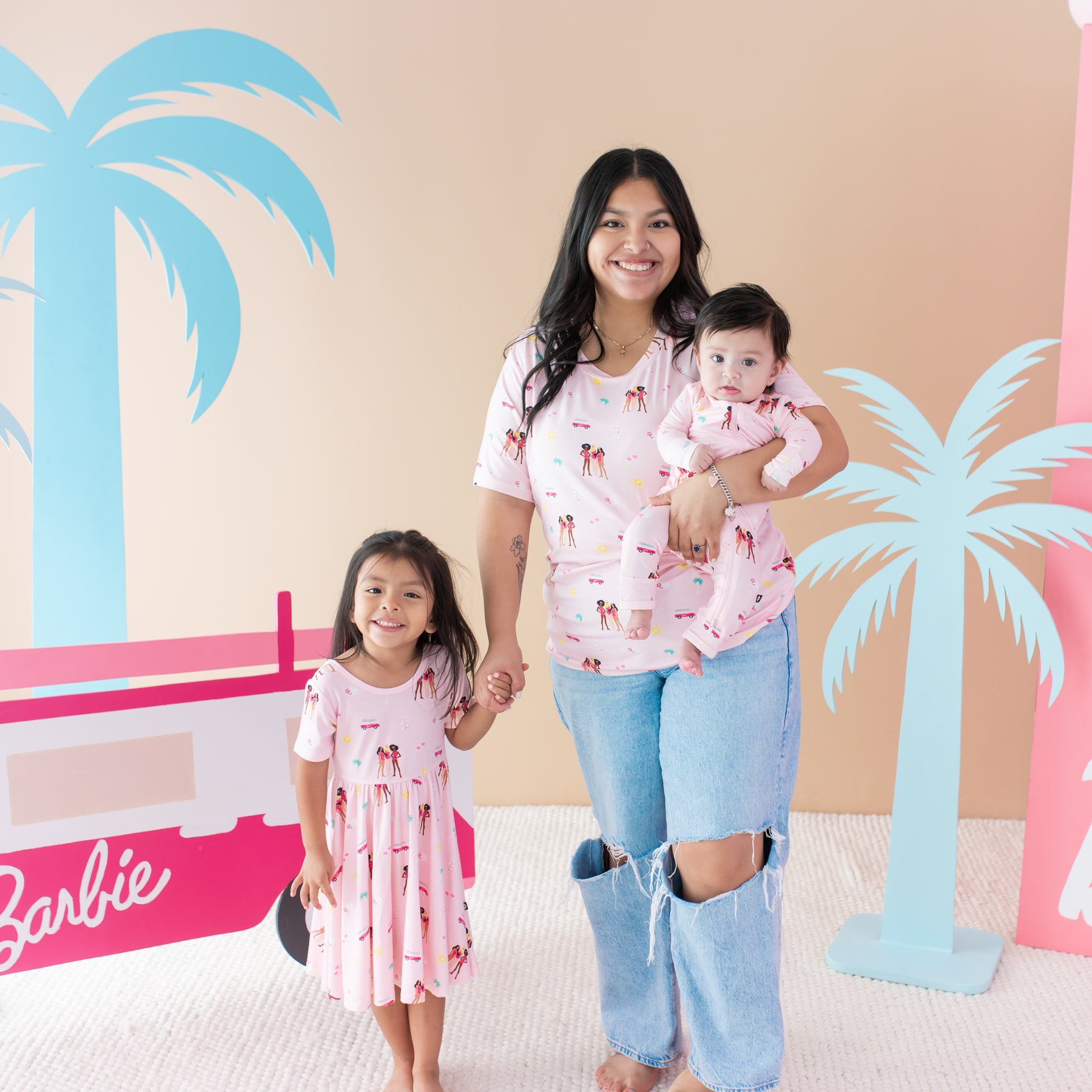 Mom wearing Women's Crew Neck Tee in Barbie™ Beach with kids