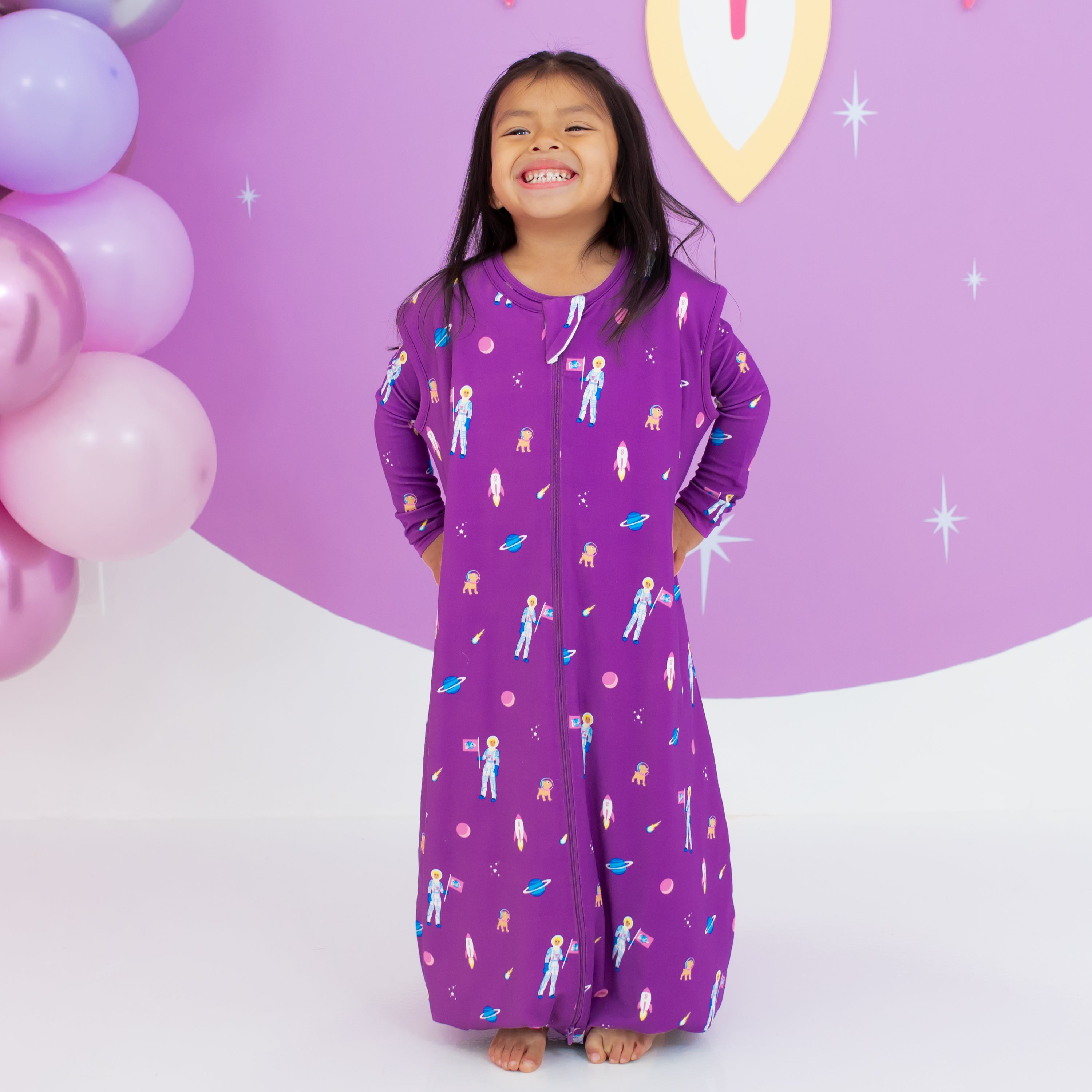 Child smiling modeling Sleep Bag Walker in Barbie™ Astronaut 1.0